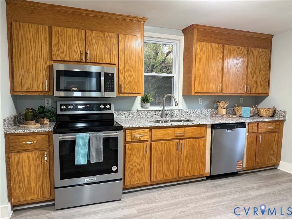1748 Youngs Road Petersburg, VA 23803 - Photo 14 of 25 Kitchen with appliances with stainless steel finis