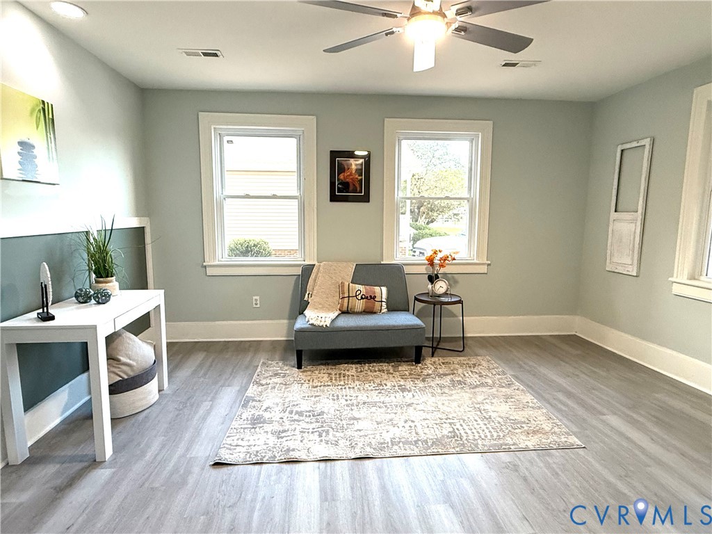 1748 Youngs Road Petersburg, VA 23803 - Photo 2 of 25 Living area featuring light wood-style floors, ple