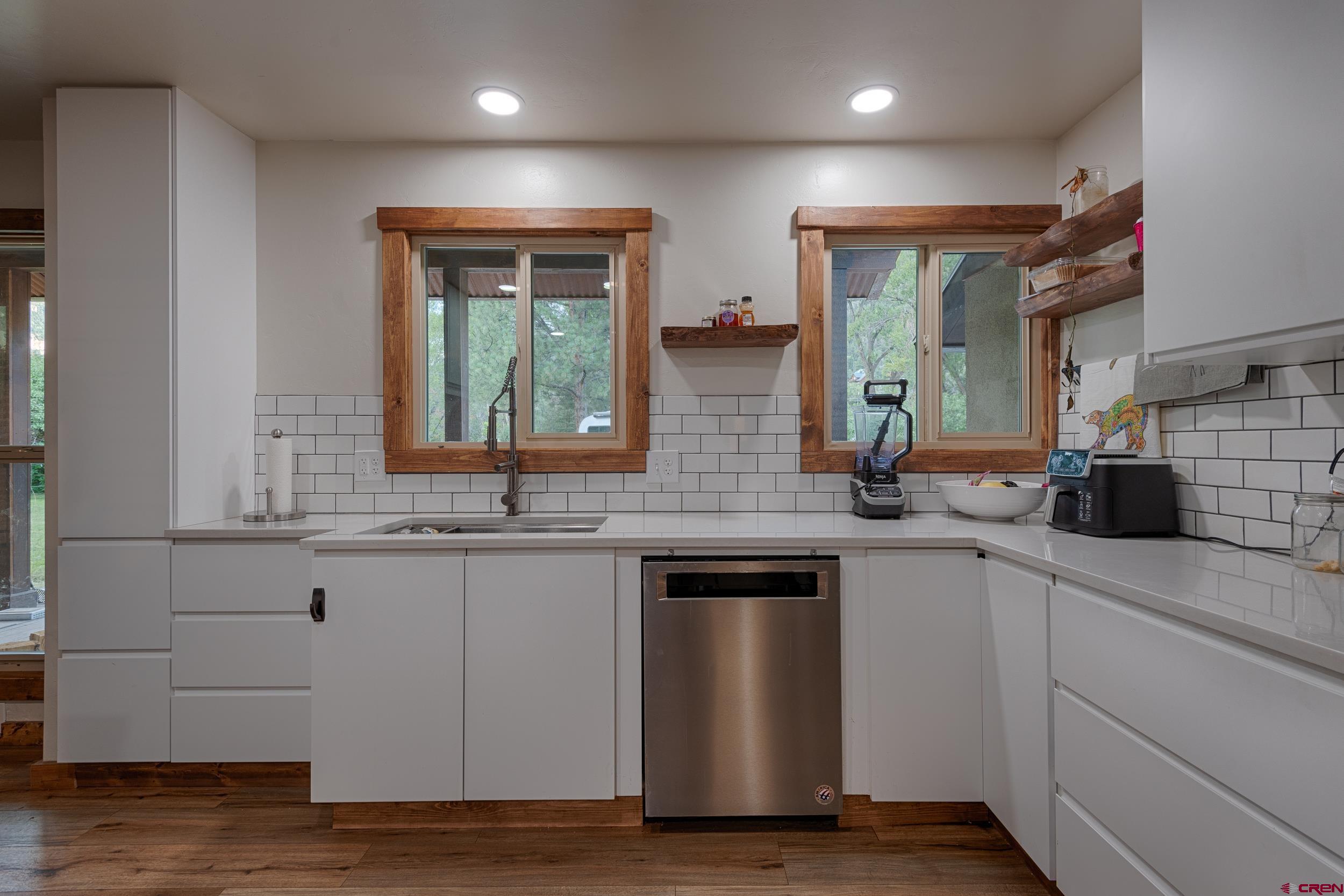 559 Suzanne Lane Ridgway, CO 81432 - Photo 7 of 45 a kitchen with sink and window