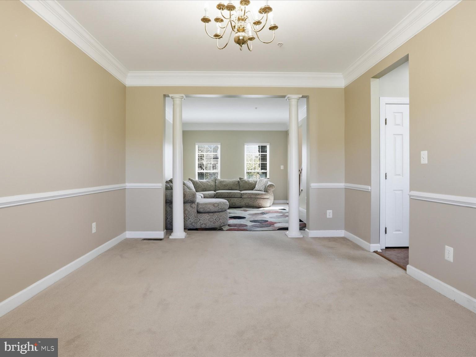 14202 Derby Ridge Road Bowie, MD 20721 - Photo 11 of 57 DINING RM WITH BASE, CHAIR AND CROWN MOLDING