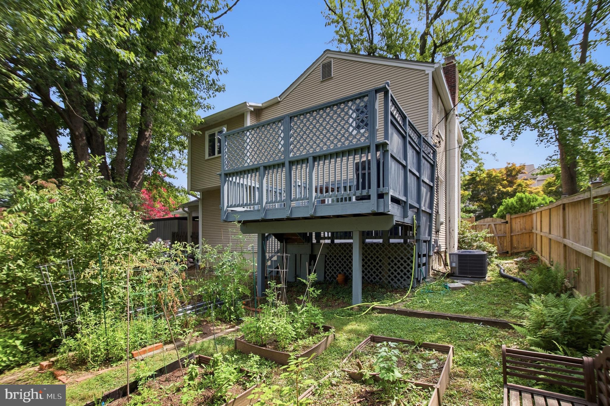 215 West George Mason Road Falls Church, VA 22046 - Photo 46 of 50 a view of a house with backyard and sitting area