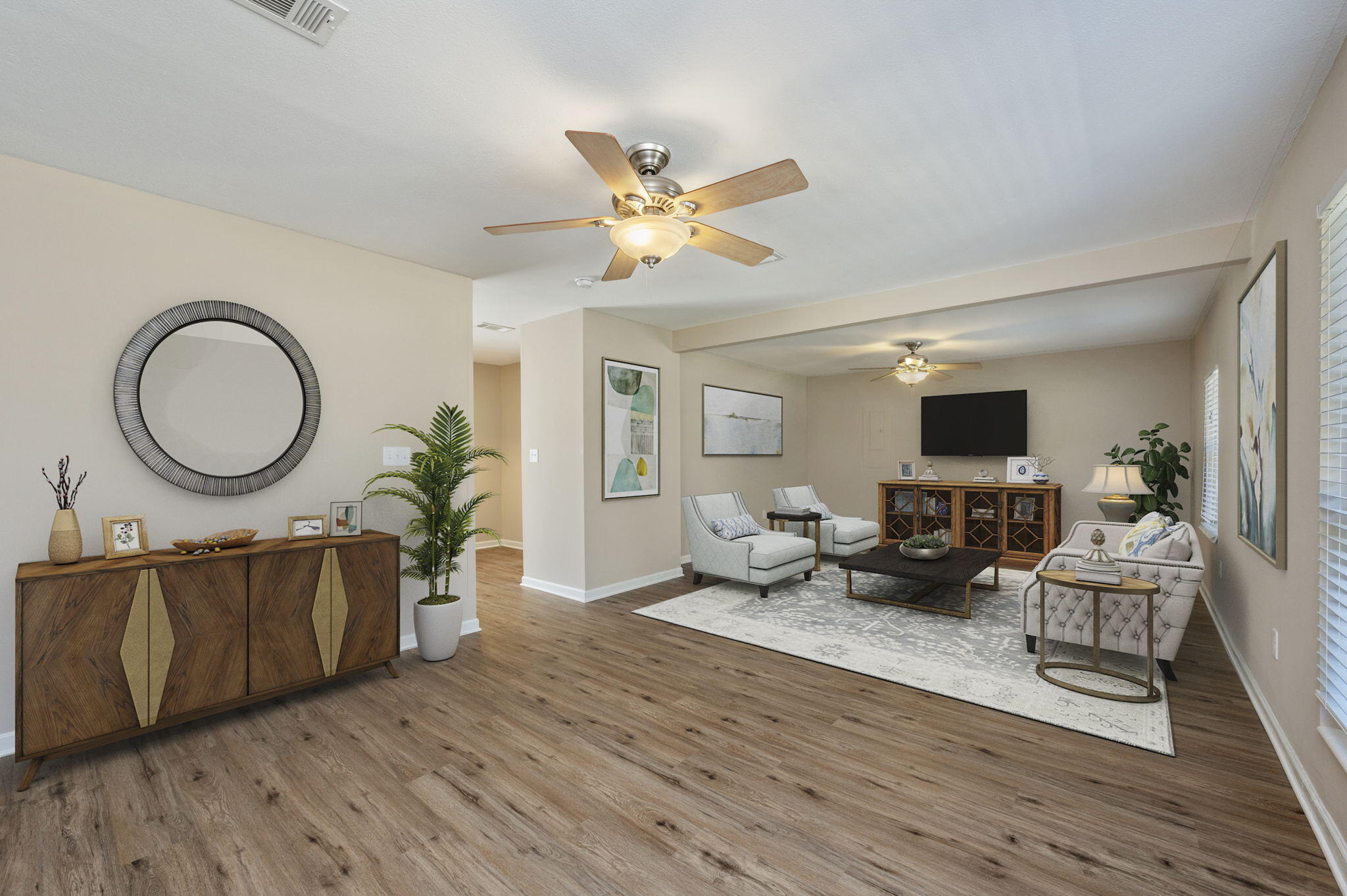 512 23rd Street Niceville, FL 32578 - Photo 4 of 19 a living room with furniture a mirror and a flat screen tv