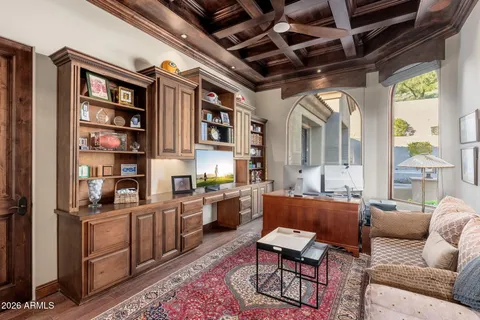 a kitchen with stainless steel appliances kitchen island granite countertop a sink and cabinets