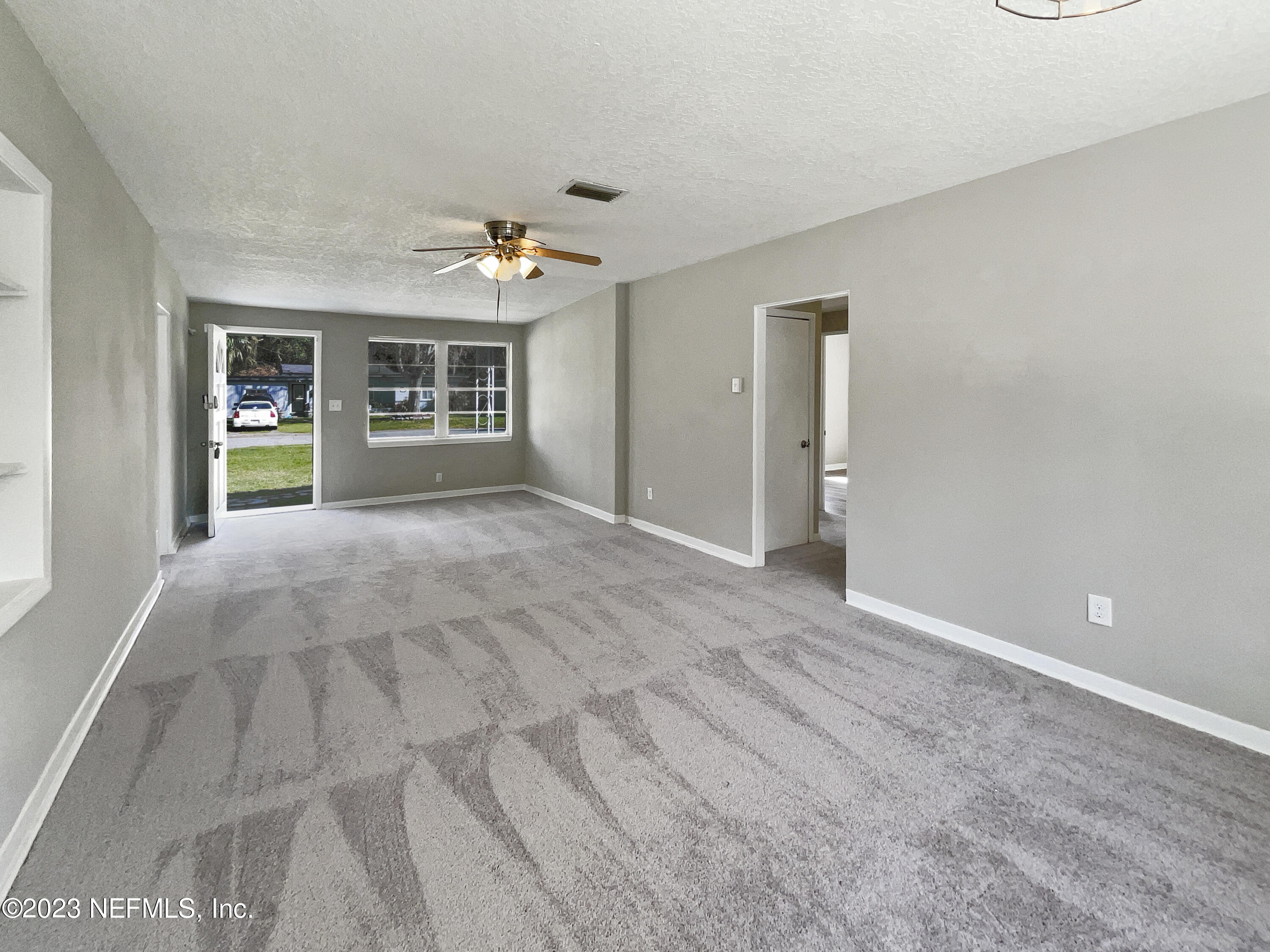 5624 Orangewood Road Jacksonville, FL 32207 - Photo 12 of 19 a view of a livingroom with a kitchen