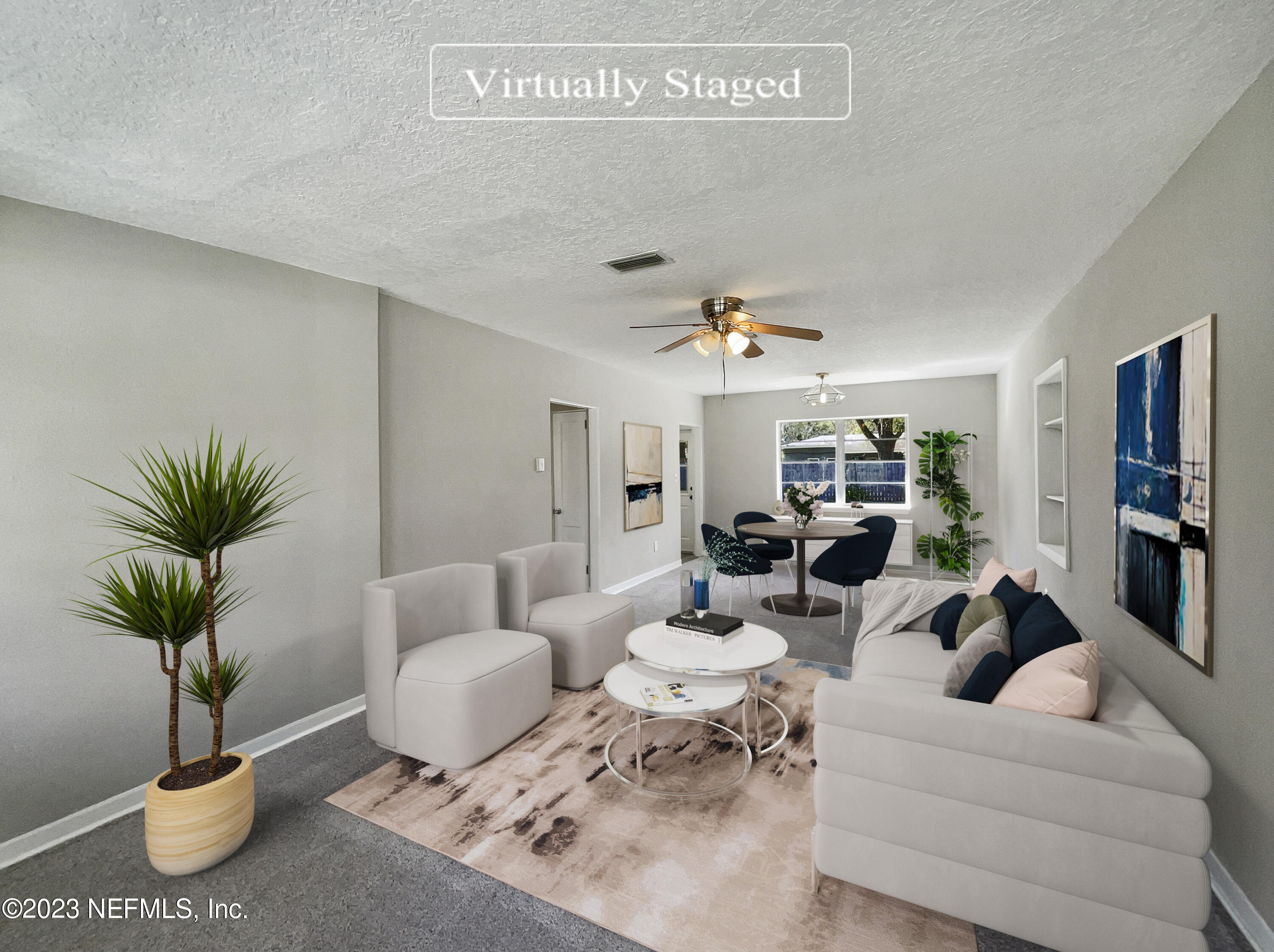 5624 Orangewood Road Jacksonville, FL 32207 - Photo 2 of 19 a living room with furniture potted plant and a table