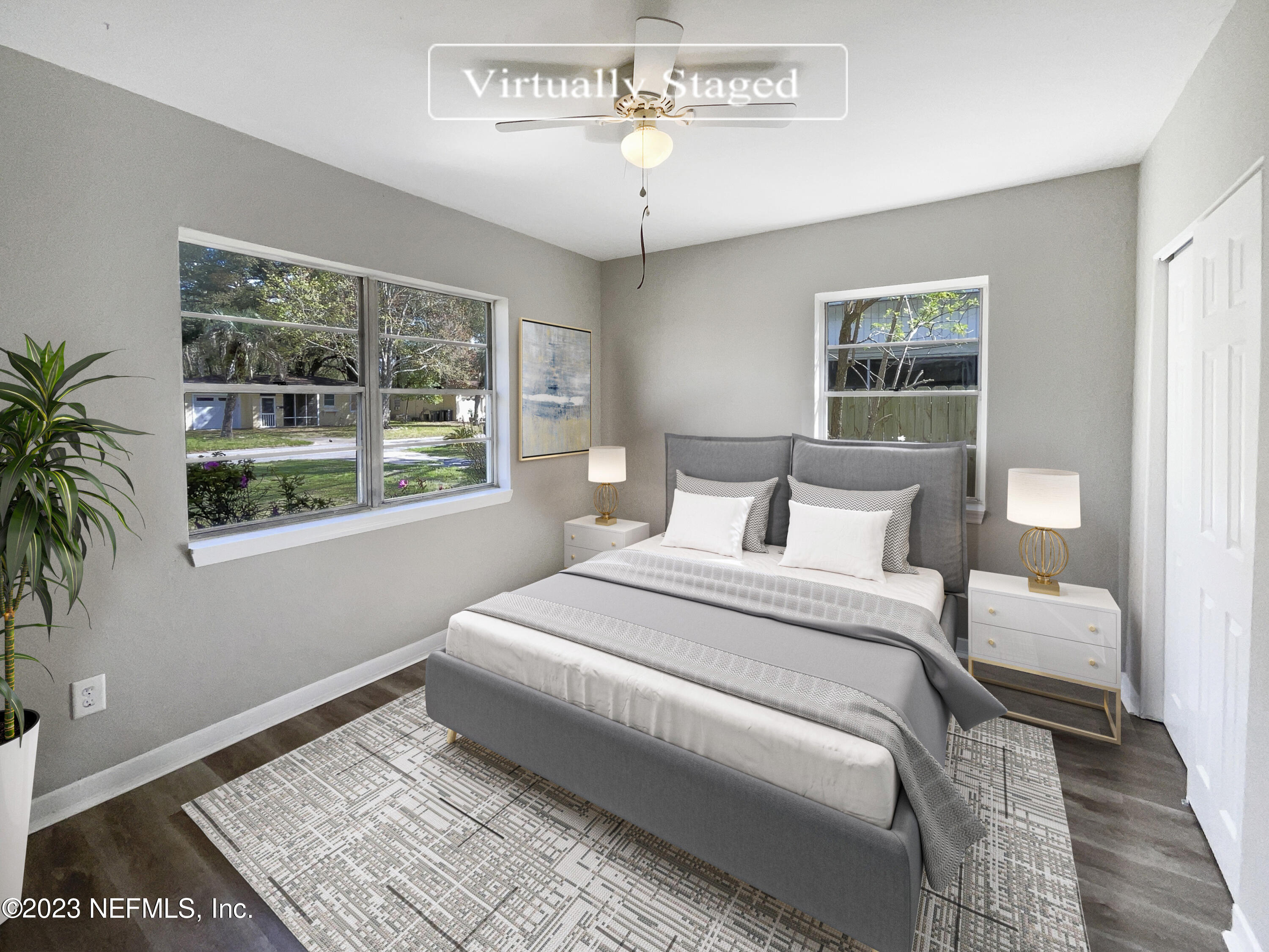 5624 Orangewood Road Jacksonville, FL 32207 - Photo 4 of 19 a bedroom with a large bed and a window