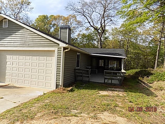 6340 Britt Road Macon, GA 31216 - Photo 2 of 21 a view of a house with a backyard and chairs