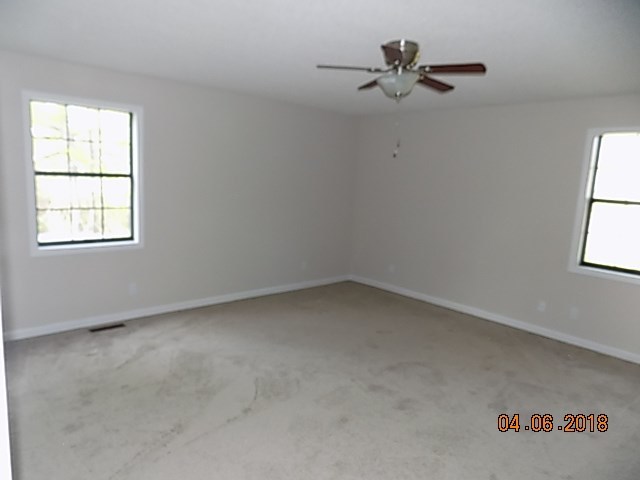 6340 Britt Road Macon, GA 31216 - Photo 17 of 21 an empty room with a window and a fan