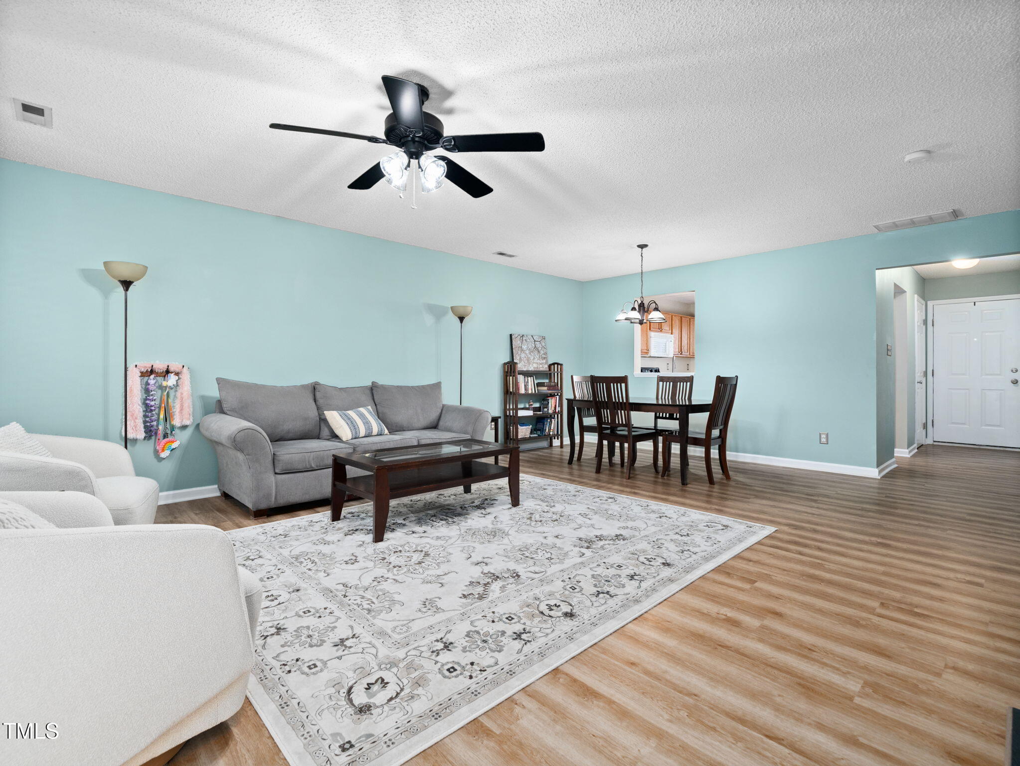 209 Climbing Ivy Court Cary, NC 27511 - Photo 12 of 24 a living room with furniture