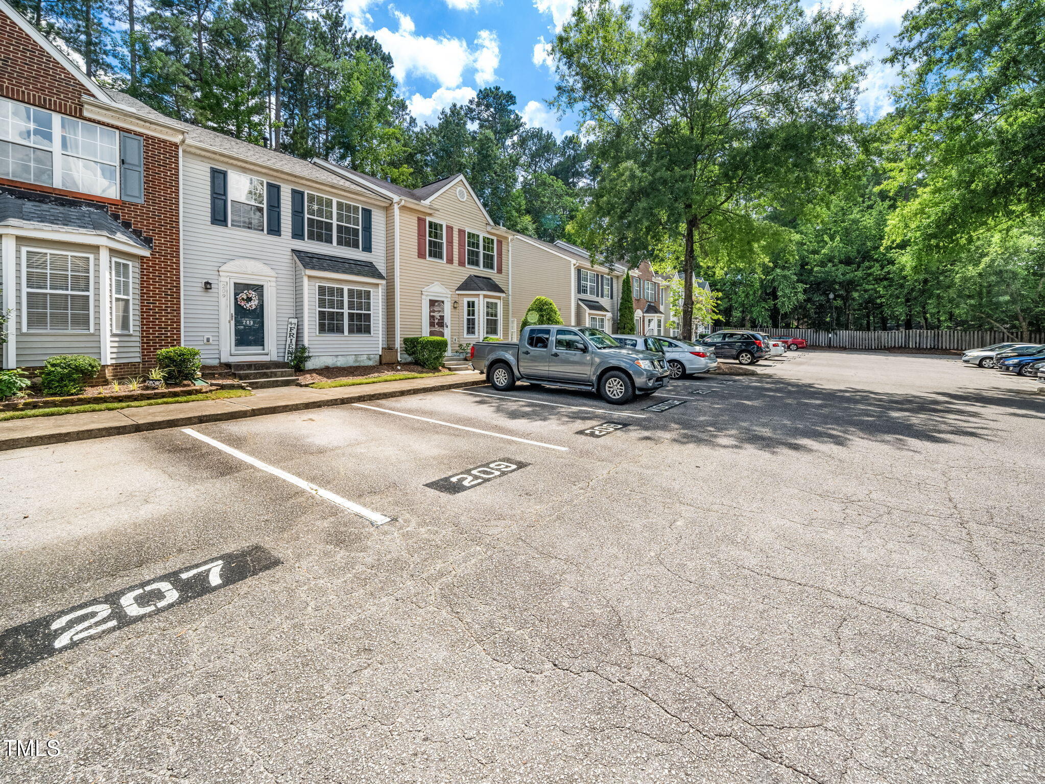 209 Climbing Ivy Court Cary, NC 27511 - Photo 23 of 24 a view of a house with a patio