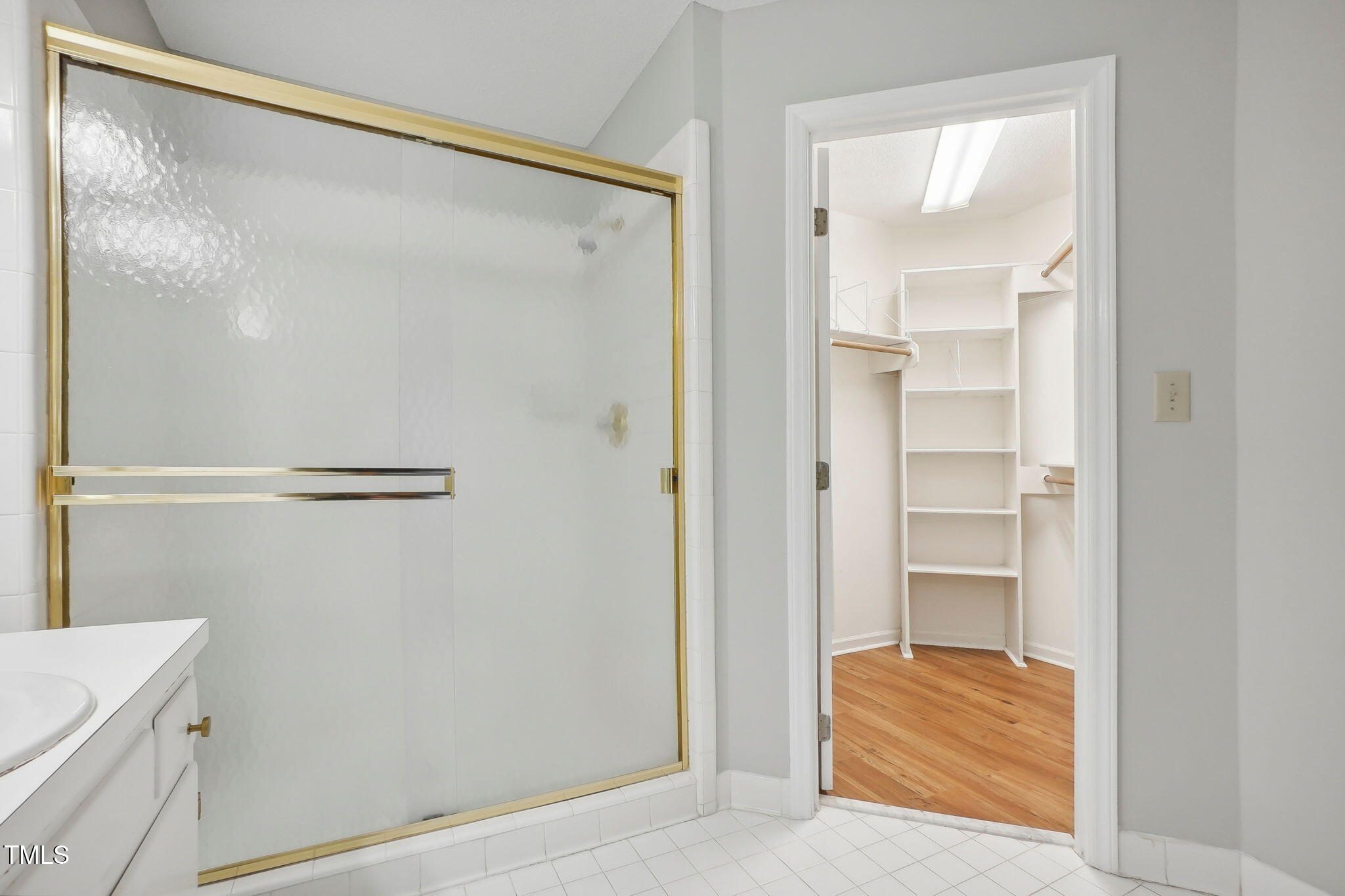 31 Renwick Court Raleigh, NC 27615 - Photo 20 of 32 a view of walk in closet with empty racks