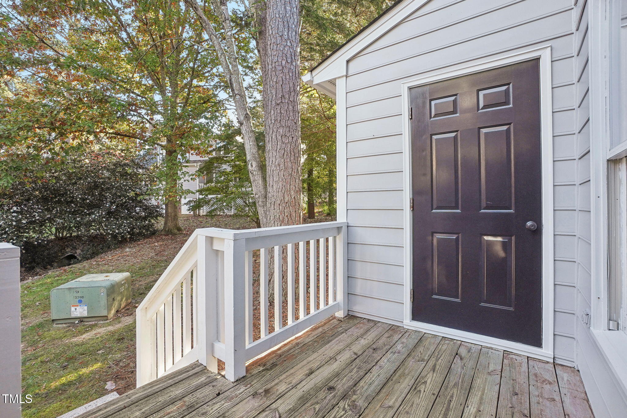 31 Renwick Court Raleigh, NC 27615 - Photo 30 of 32 a view of a wooden deck
