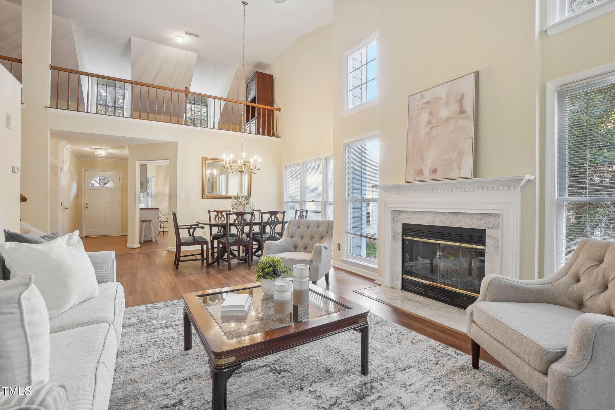 31 Renwick Court Raleigh, NC 27615 - Photo 5 of 32 a living room with furniture and a fireplace