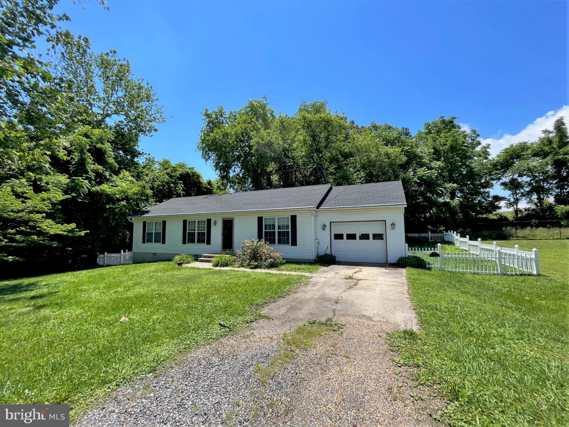 157 Cove Point Road Lusby, MD 20657 - Photo 1 of 19 a front view of a house with yard