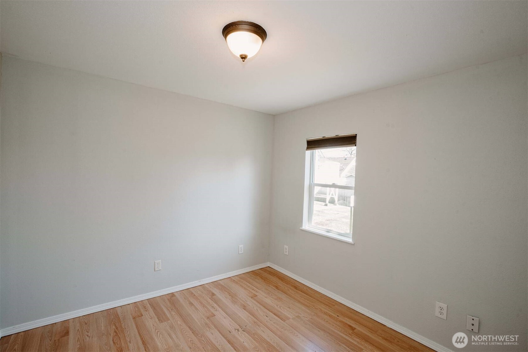 2220 Summit Avenue Everett, WA 98201 - Photo 11 of 26 a view of a room that has a window and wooden floor