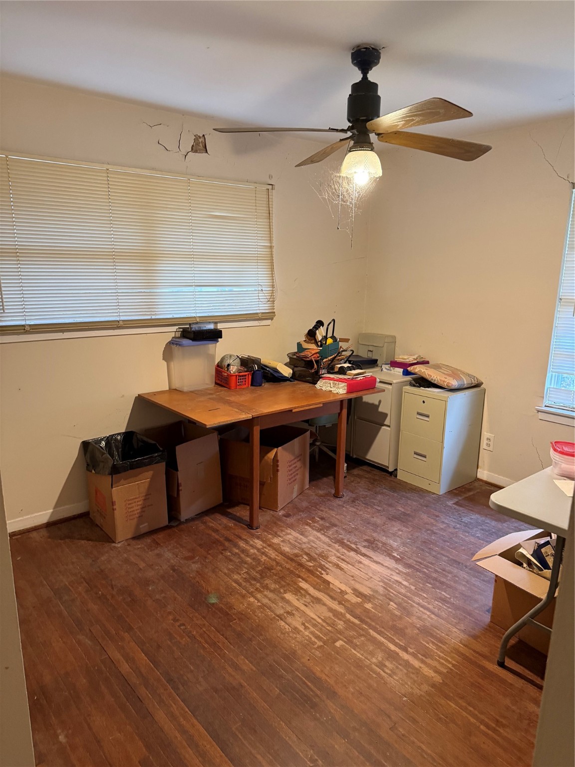 10906 Stover Street Houston, TX 77075 - Photo 12 of 19 a gym room with wooden floor and furniture