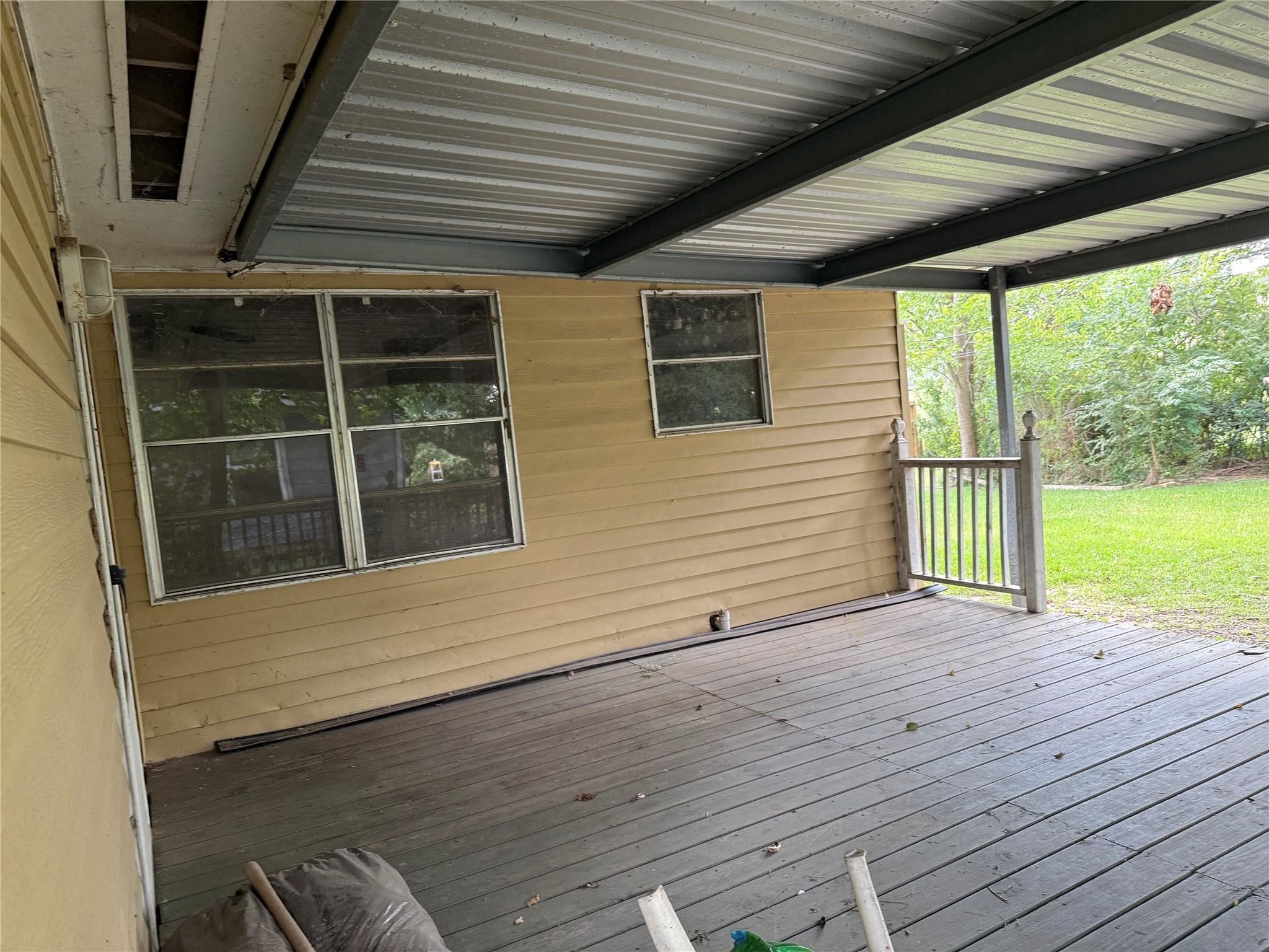 10906 Stover Street Houston, TX 77075 - Photo 16 of 19 a view of a house with a deck