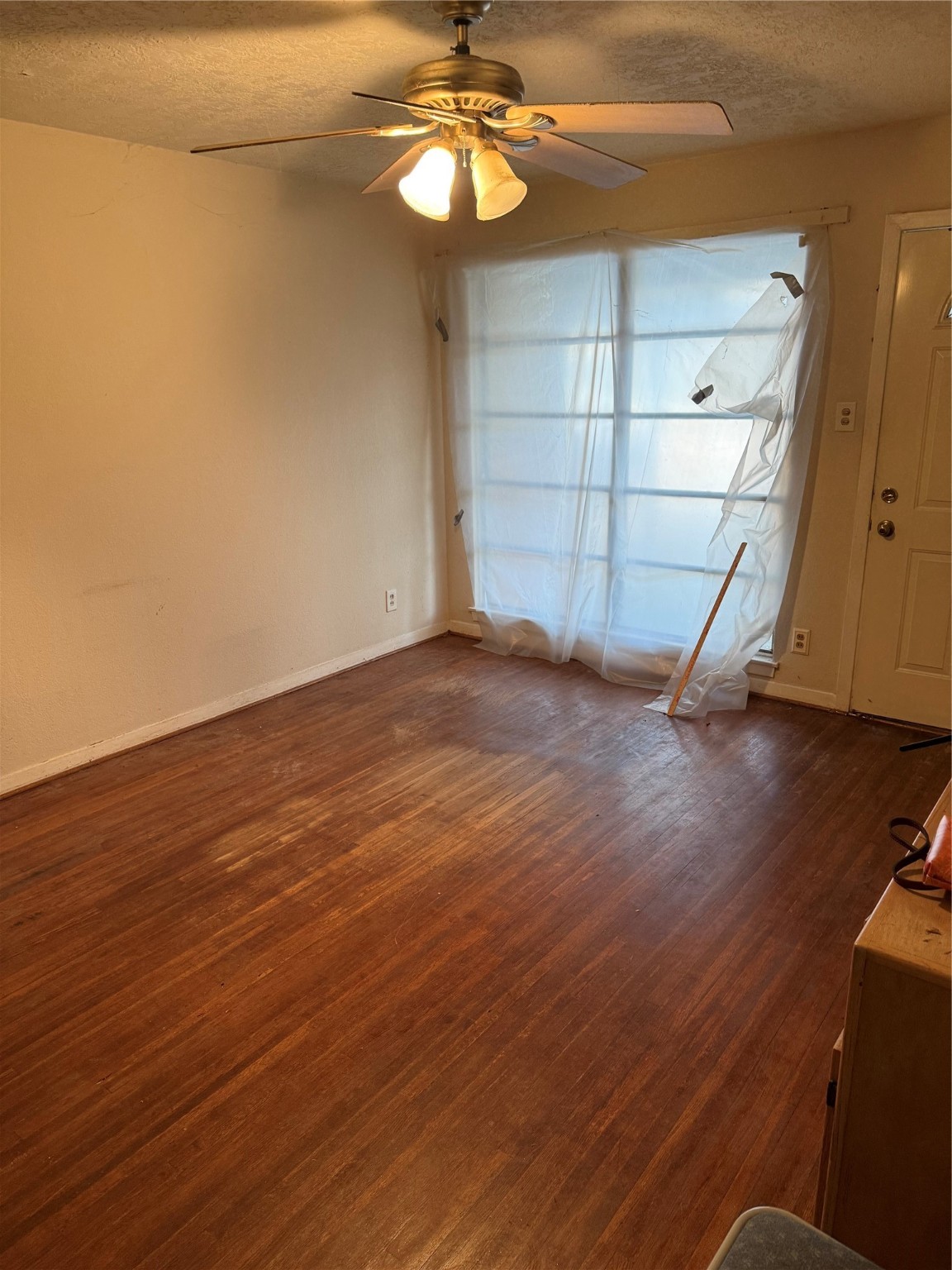 10906 Stover Street Houston, TX 77075 - Photo 4 of 19 a view of empty room with wooden floor