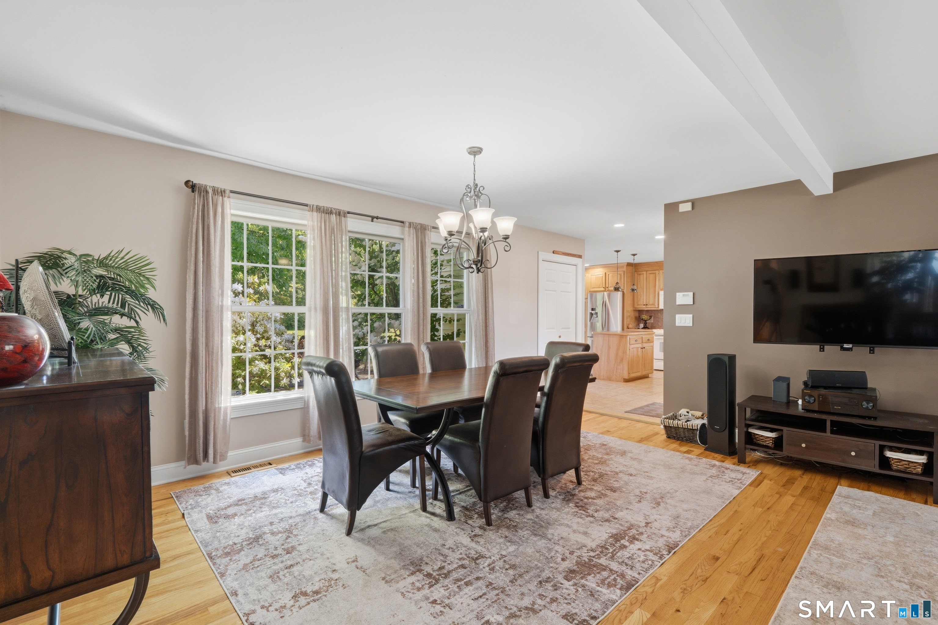 48 Case Road Burlington, CT 06013 - Photo 12 of 39 a view of a dining room with furniture window and wooden floor
