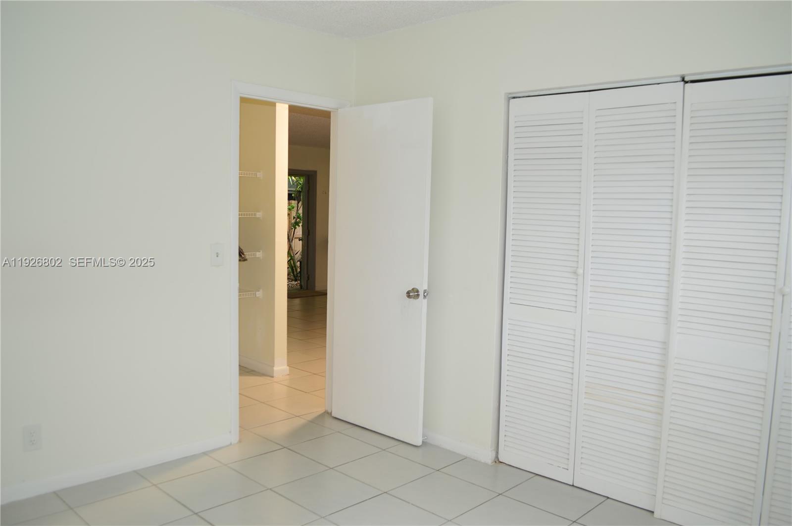274 Southwest 9th Street, Unit 2 Dania Beach, FL 33004 - Photo 14 of 24 a view of an empty room