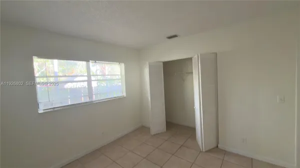 a very nice looking room with a potted plant