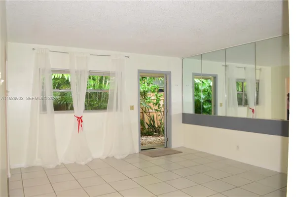 a view of an empty room with window