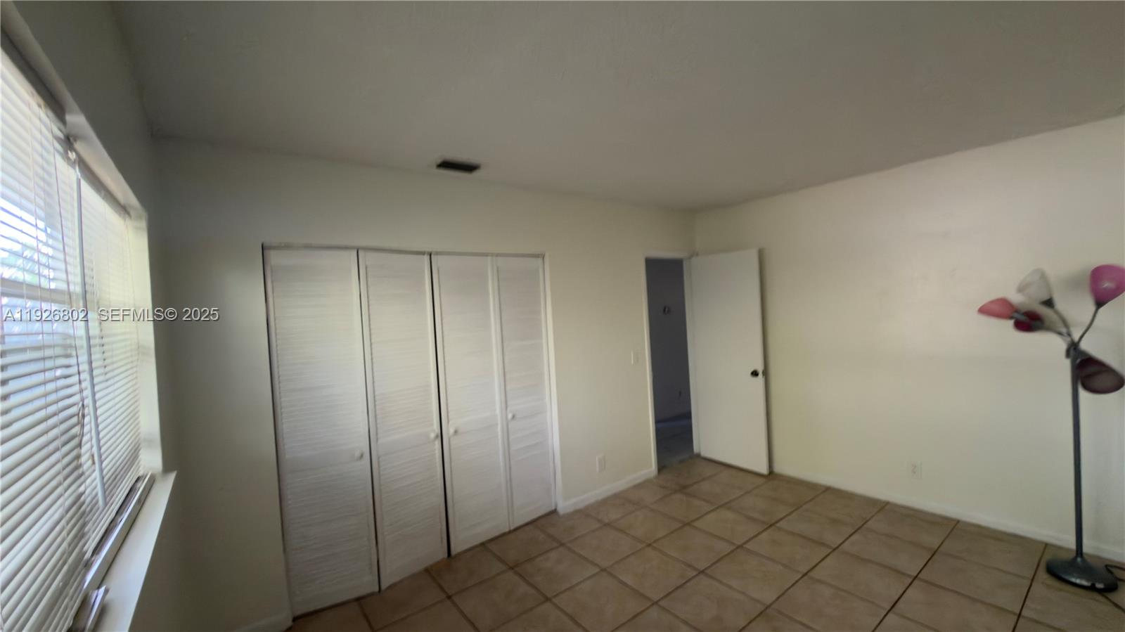 274 Southwest 9th Street, Unit 2 Dania Beach, FL 33004 - Photo 21 of 24 a view of an empty room