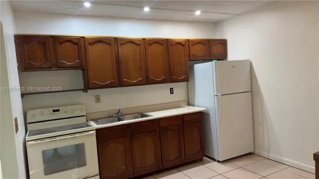 a bathroom with a toilet a sink and a bathtub