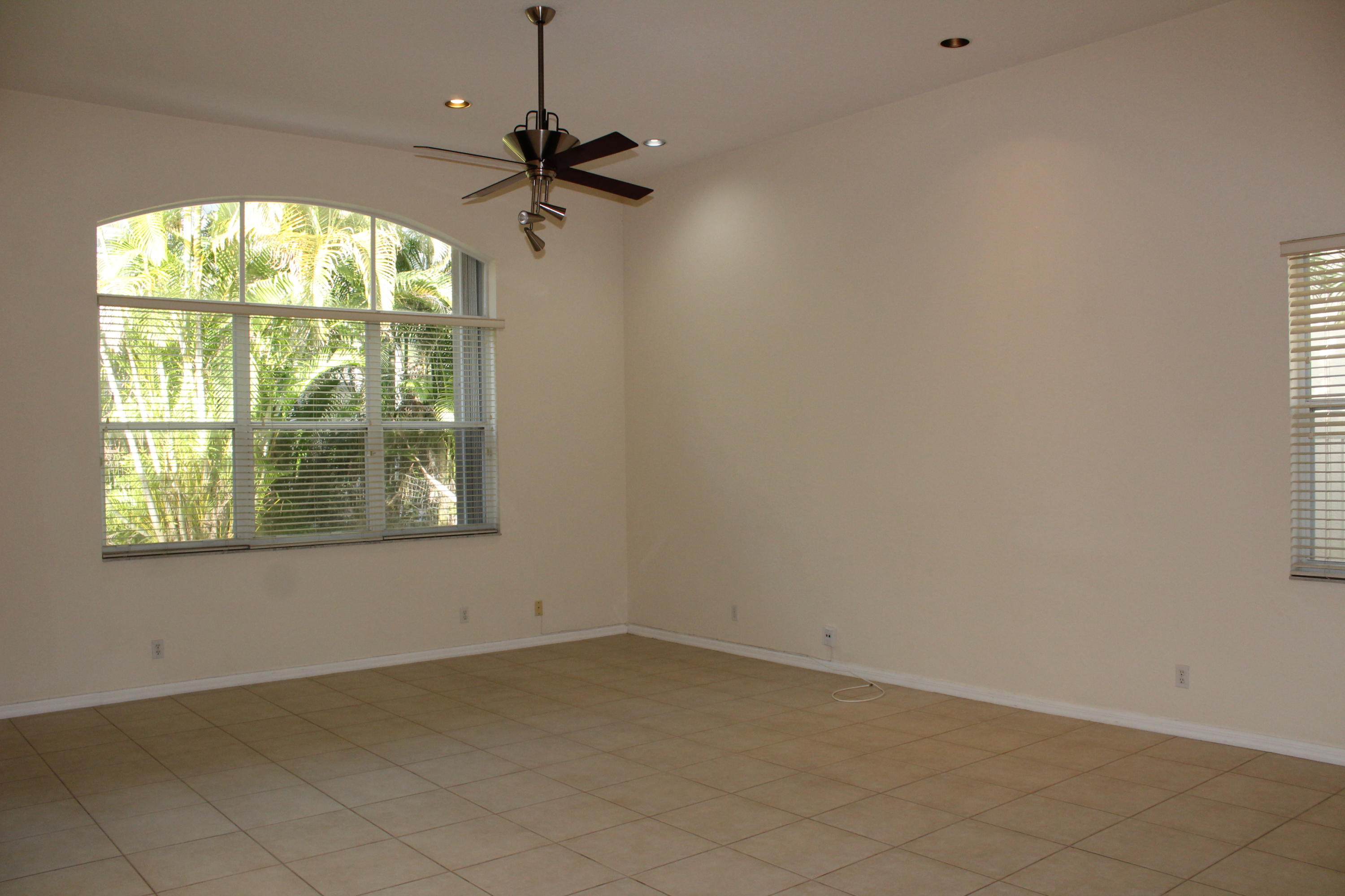 11241 Sea Grass Circle Boca Raton, FL 33498 - Photo 11 of 33 an empty room with a window