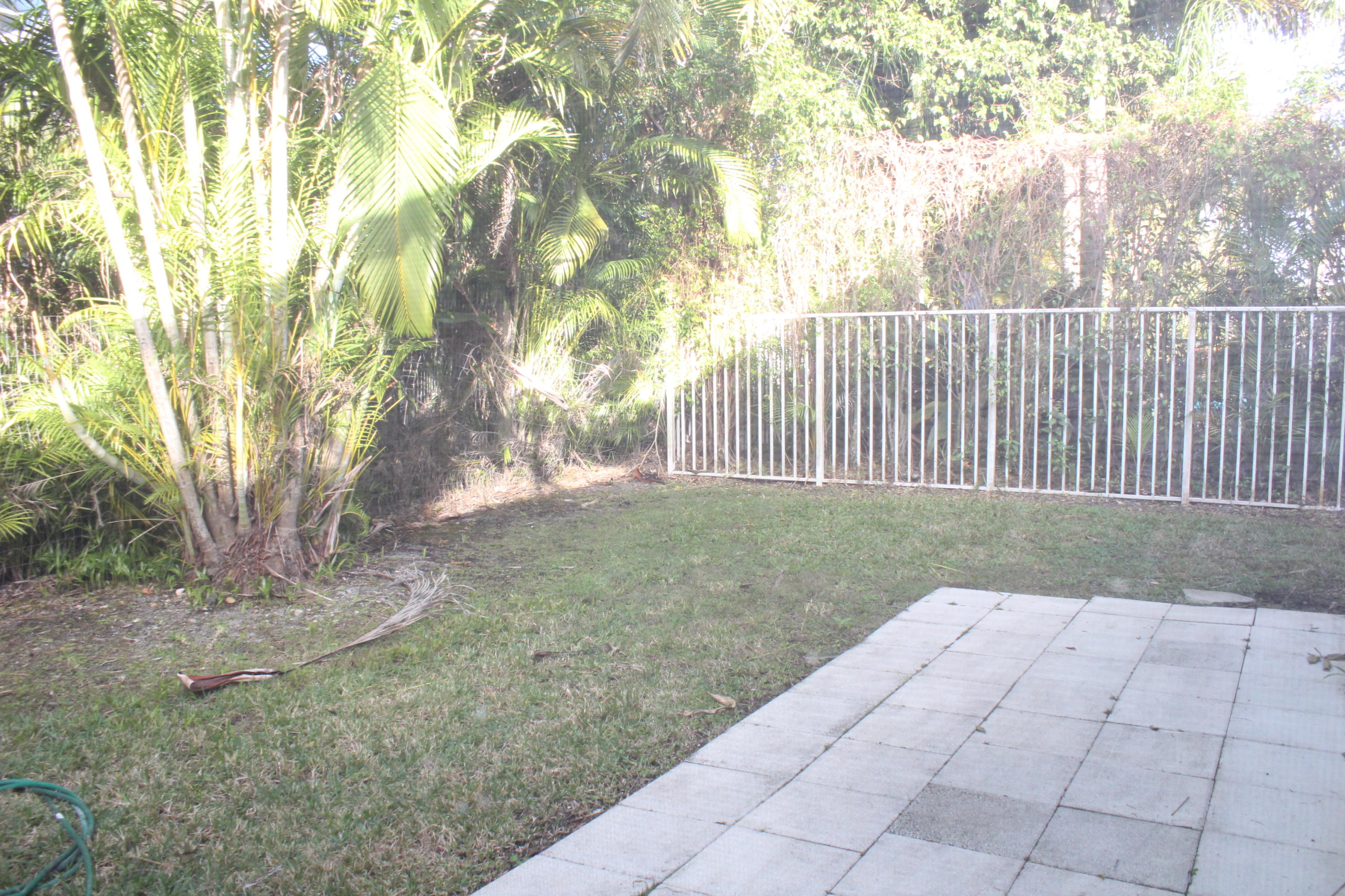 11241 Sea Grass Circle Boca Raton, FL 33498 - Photo 18 of 33 a view of backyard and tree