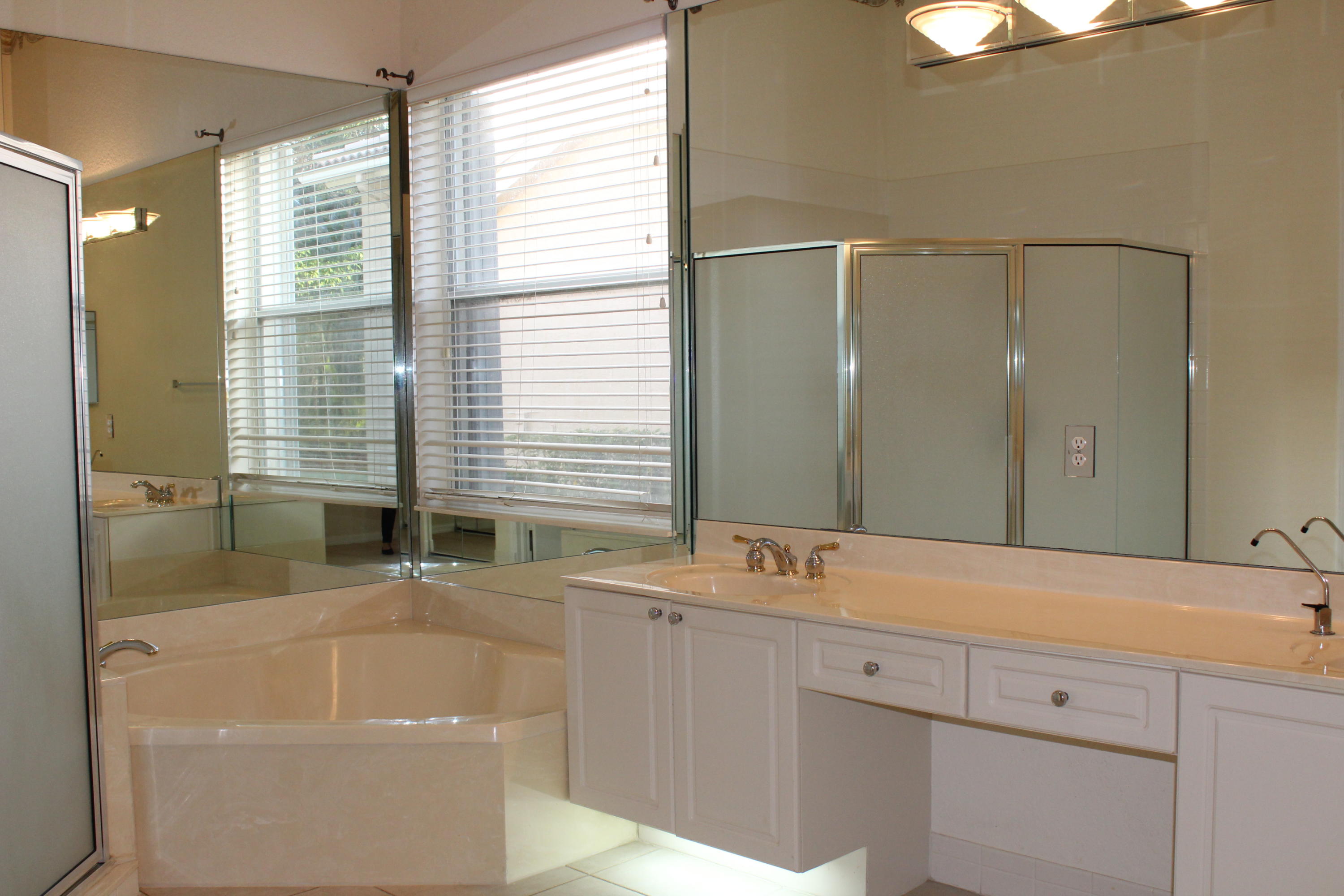 11241 Sea Grass Circle Boca Raton, FL 33498 - Photo 24 of 33 a bathroom with a sink and a bathtub