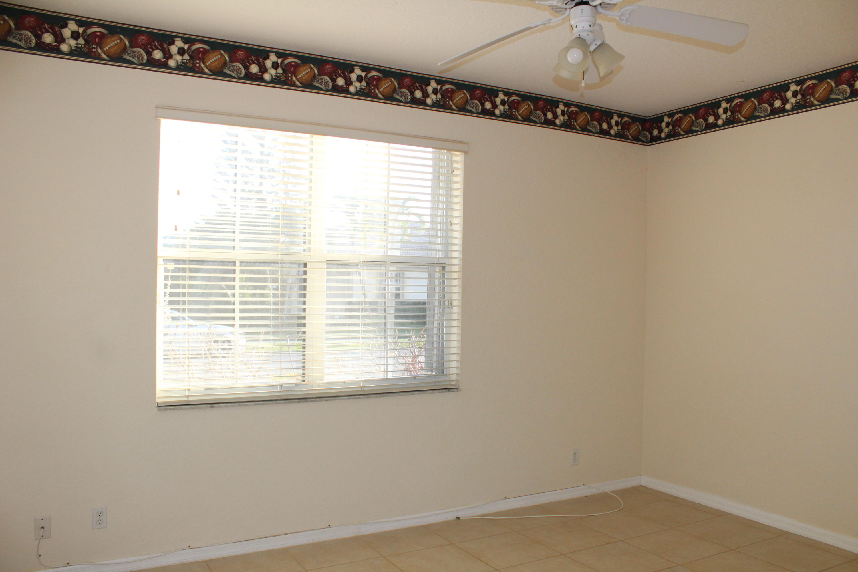 11241 Sea Grass Circle Boca Raton, FL 33498 - Photo 28 of 33 a view of a window in an empty room