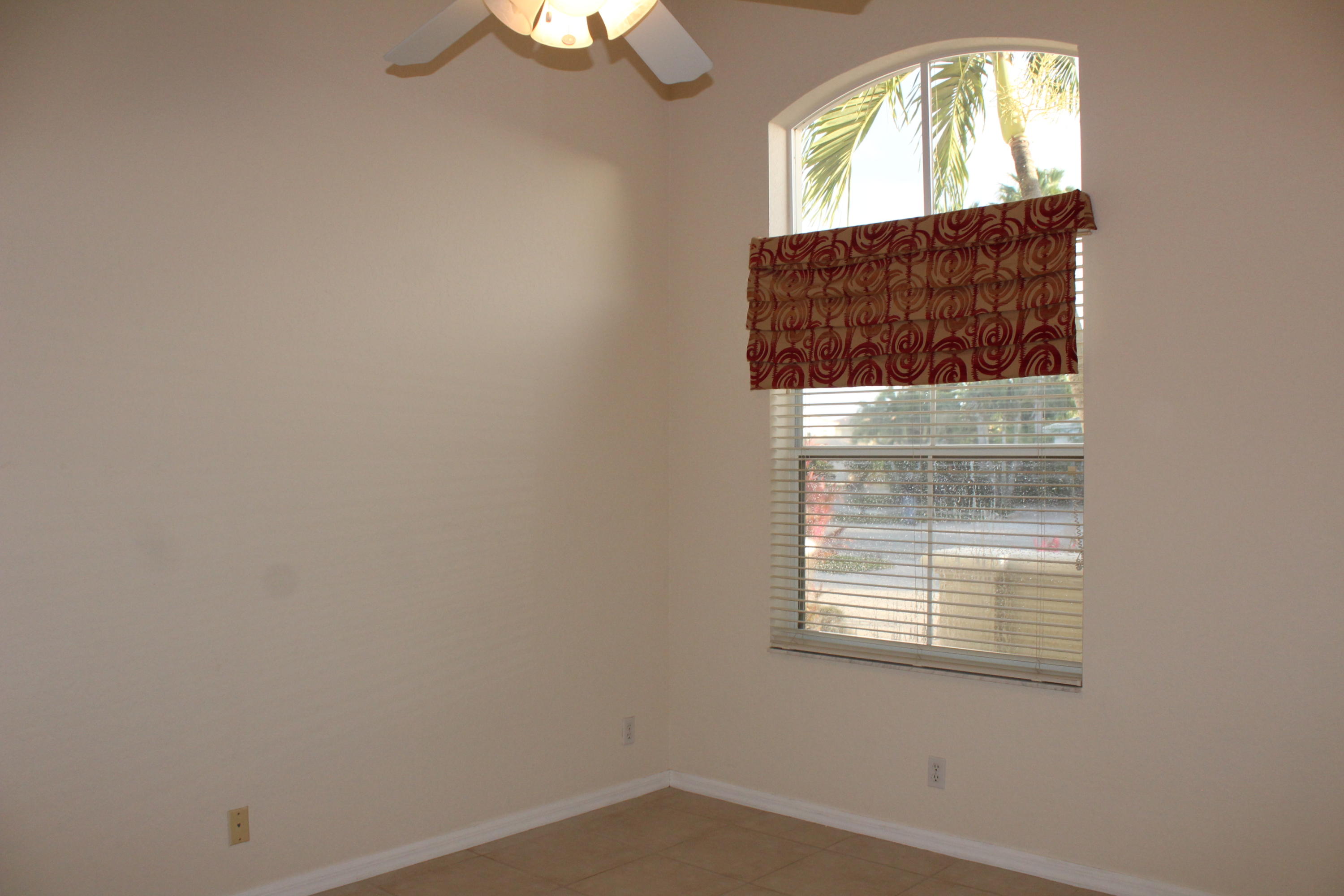 11241 Sea Grass Circle Boca Raton, FL 33498 - Photo 29 of 33 an empty room that has a window