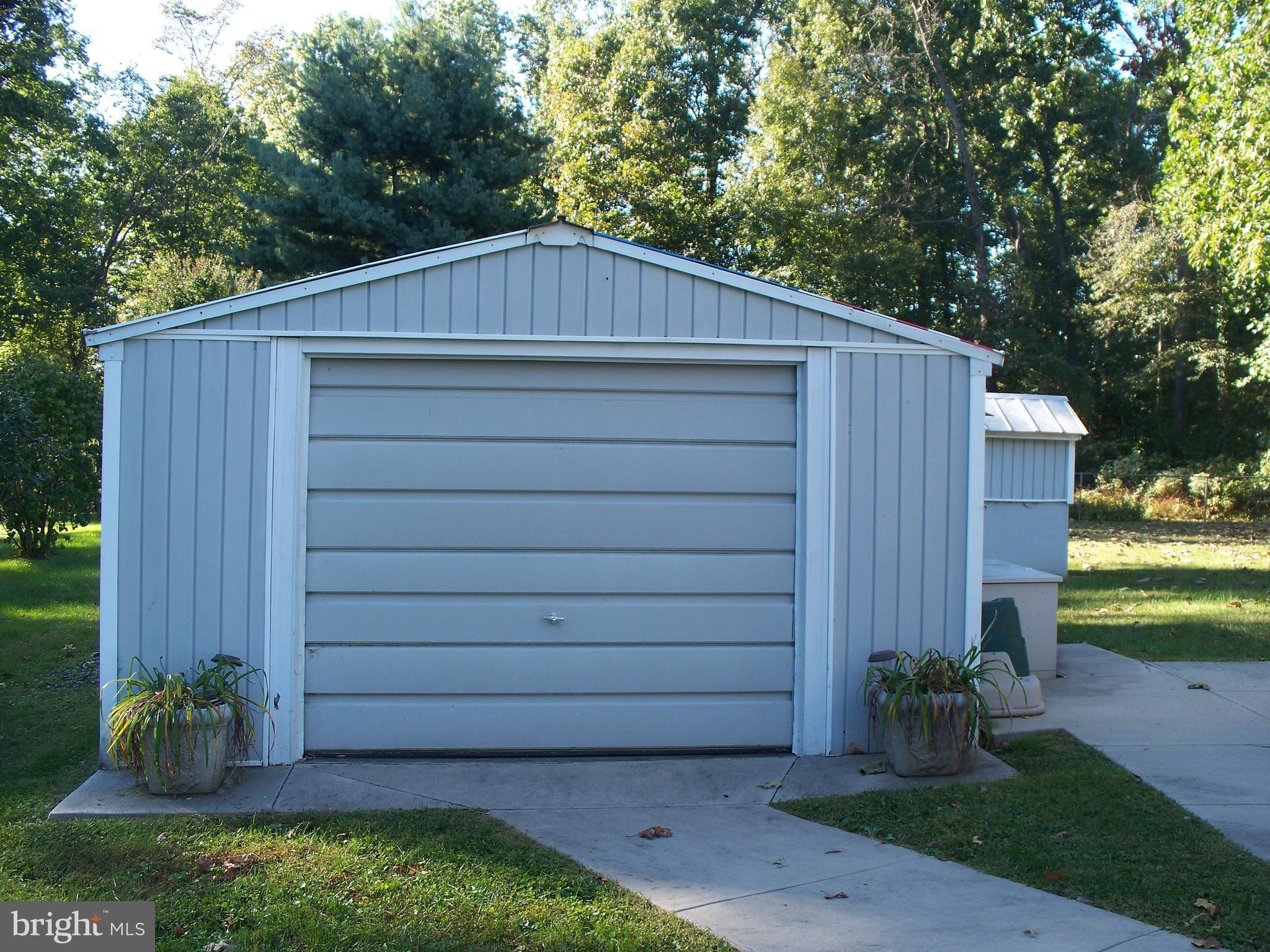 934 Coen Road Street, MD 21154 - Photo 27 of 30 Storage Shed with roll-up door