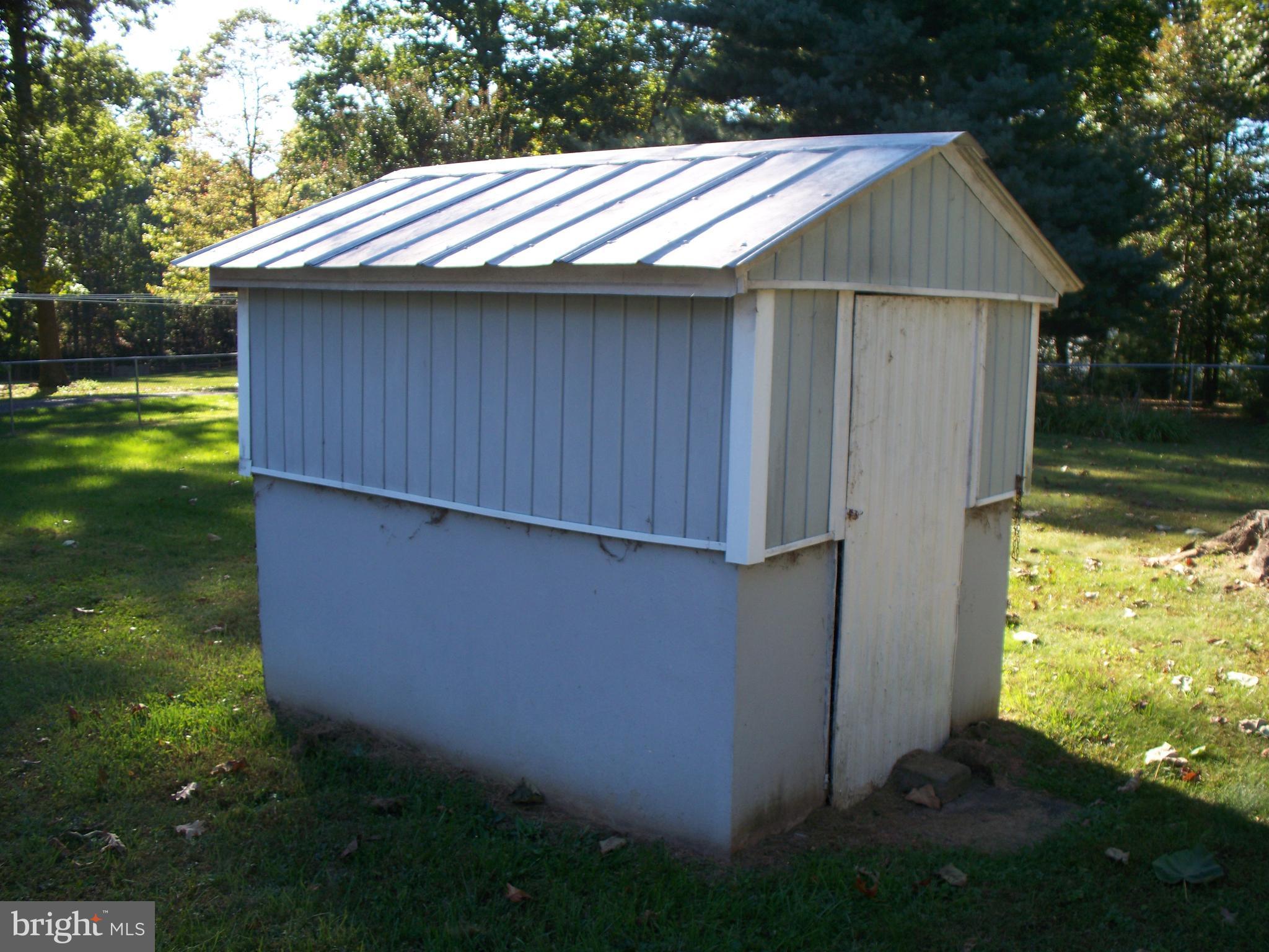 934 Coen Road Street, MD 21154 - Photo 29 of 30 Concrete and Vinyl Storage Shed