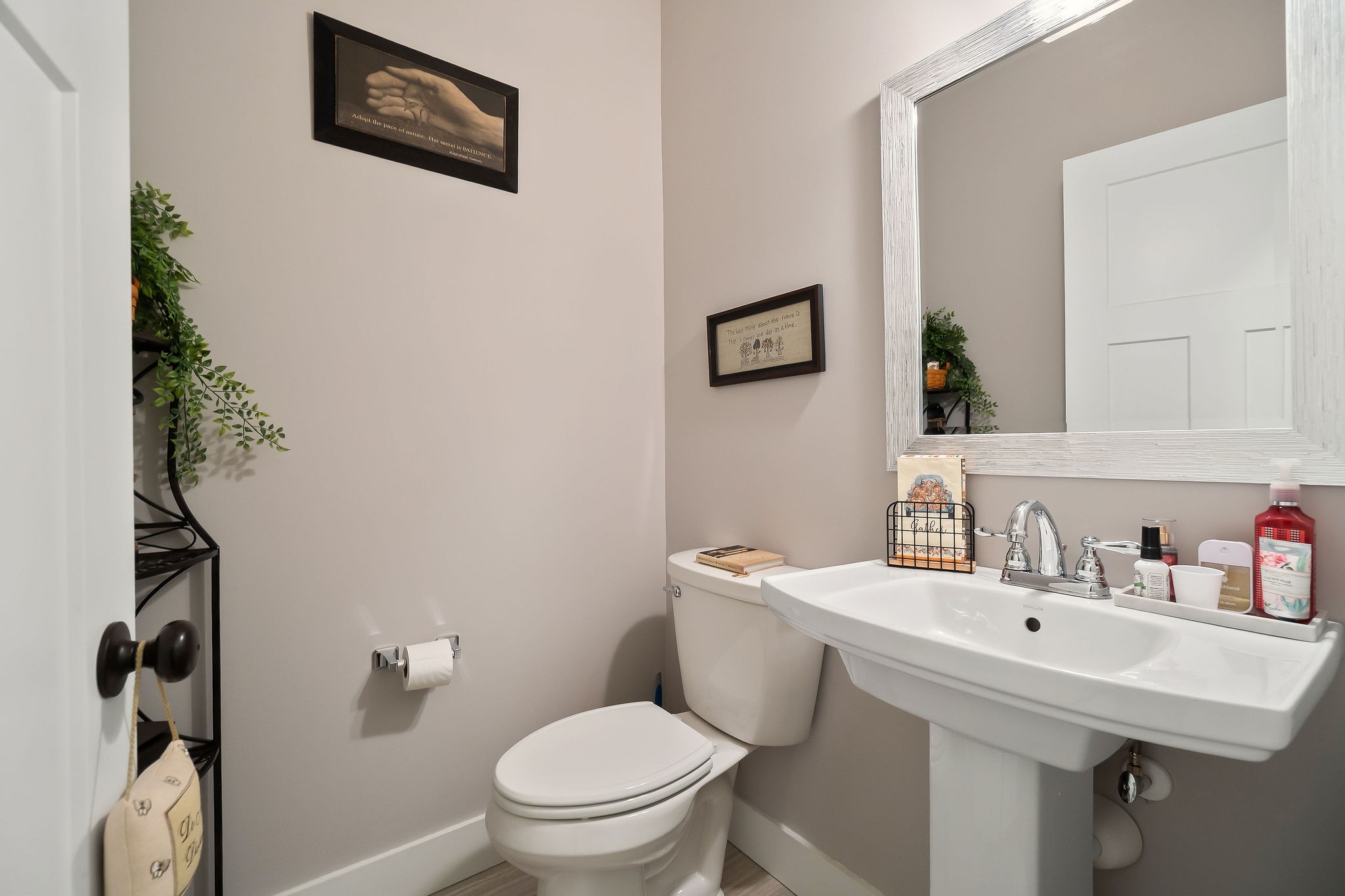 1138 Old Sparta Road Cookeville, TN 38506 - Photo 11 of 39 a bathroom with a sink mirror and toilet
