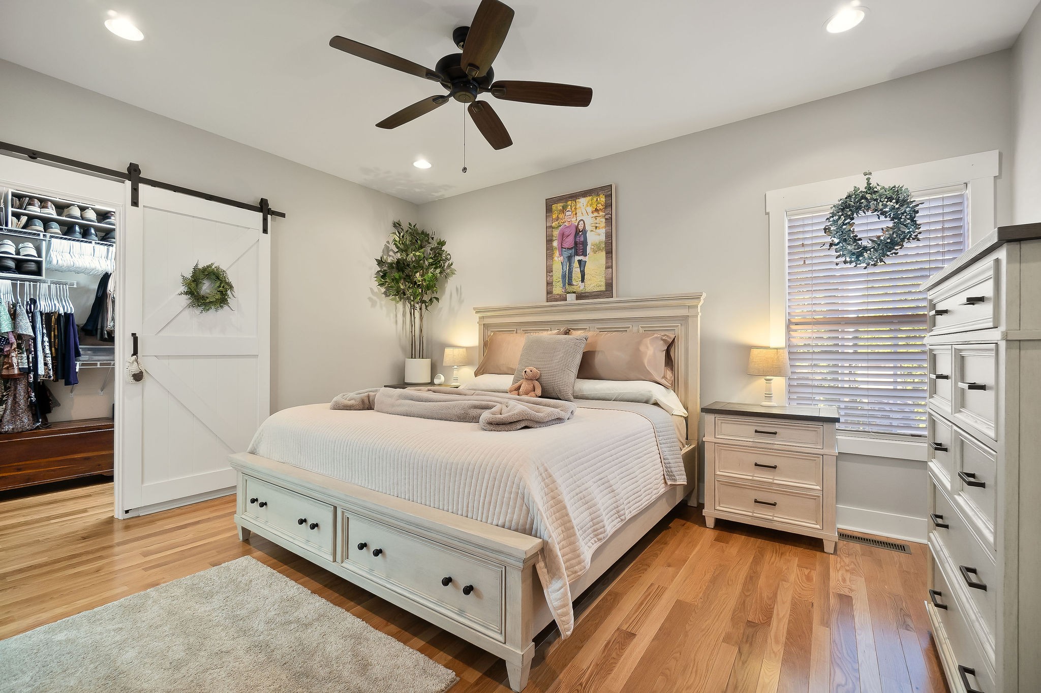 1138 Old Sparta Road Cookeville, TN 38506 - Photo 13 of 39 a bedroom with a bed and a chandelier