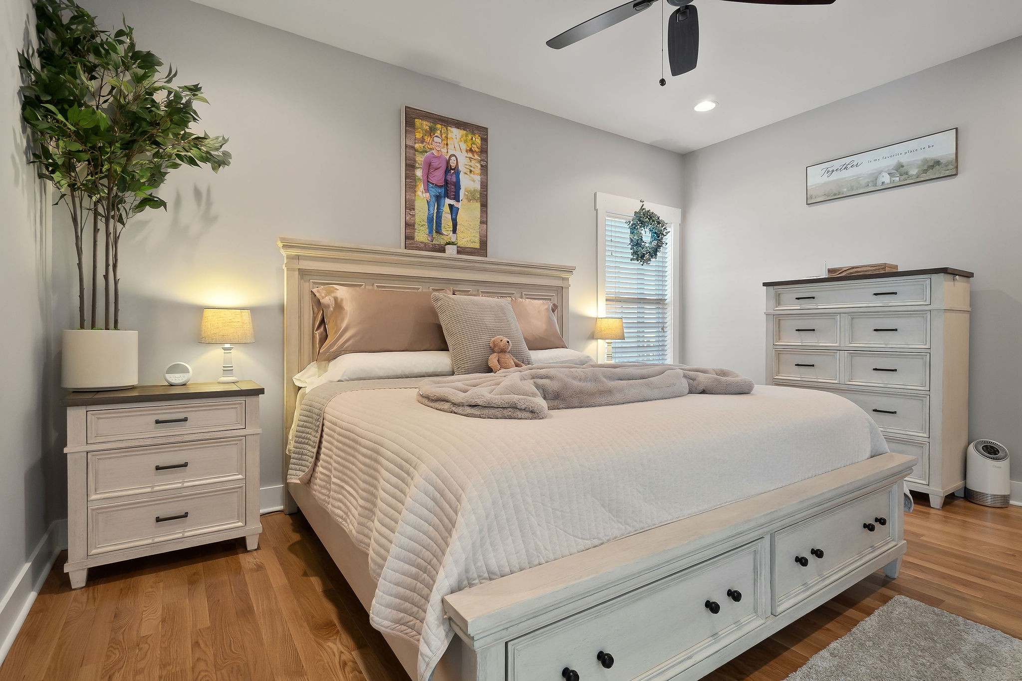 1138 Old Sparta Road Cookeville, TN 38506 - Photo 14 of 39 a bedroom with a bed and a chandelier