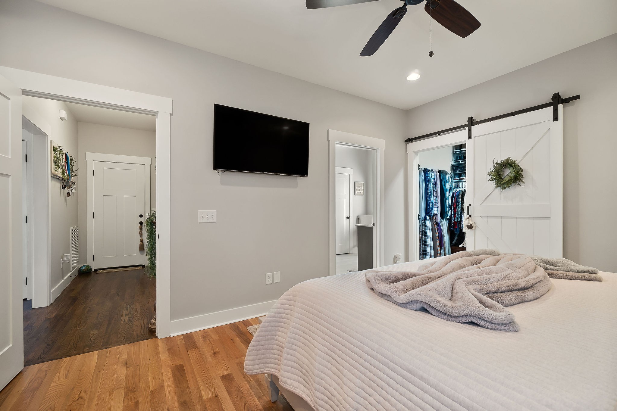 1138 Old Sparta Road Cookeville, TN 38506 - Photo 15 of 39 a bedroom with a bed and a flat screen tv