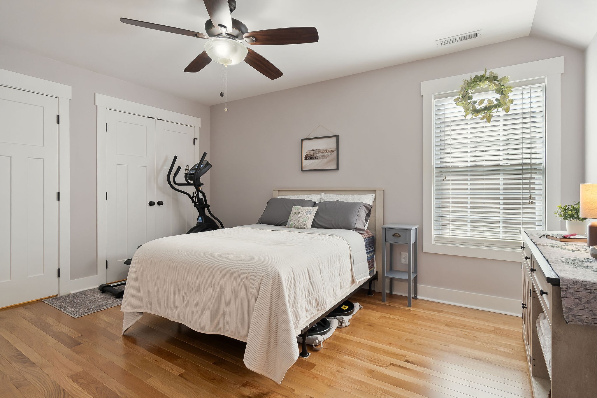 1138 Old Sparta Road Cookeville, TN 38506 - Photo 20 of 39 a bedroom with a bed and a chandelier