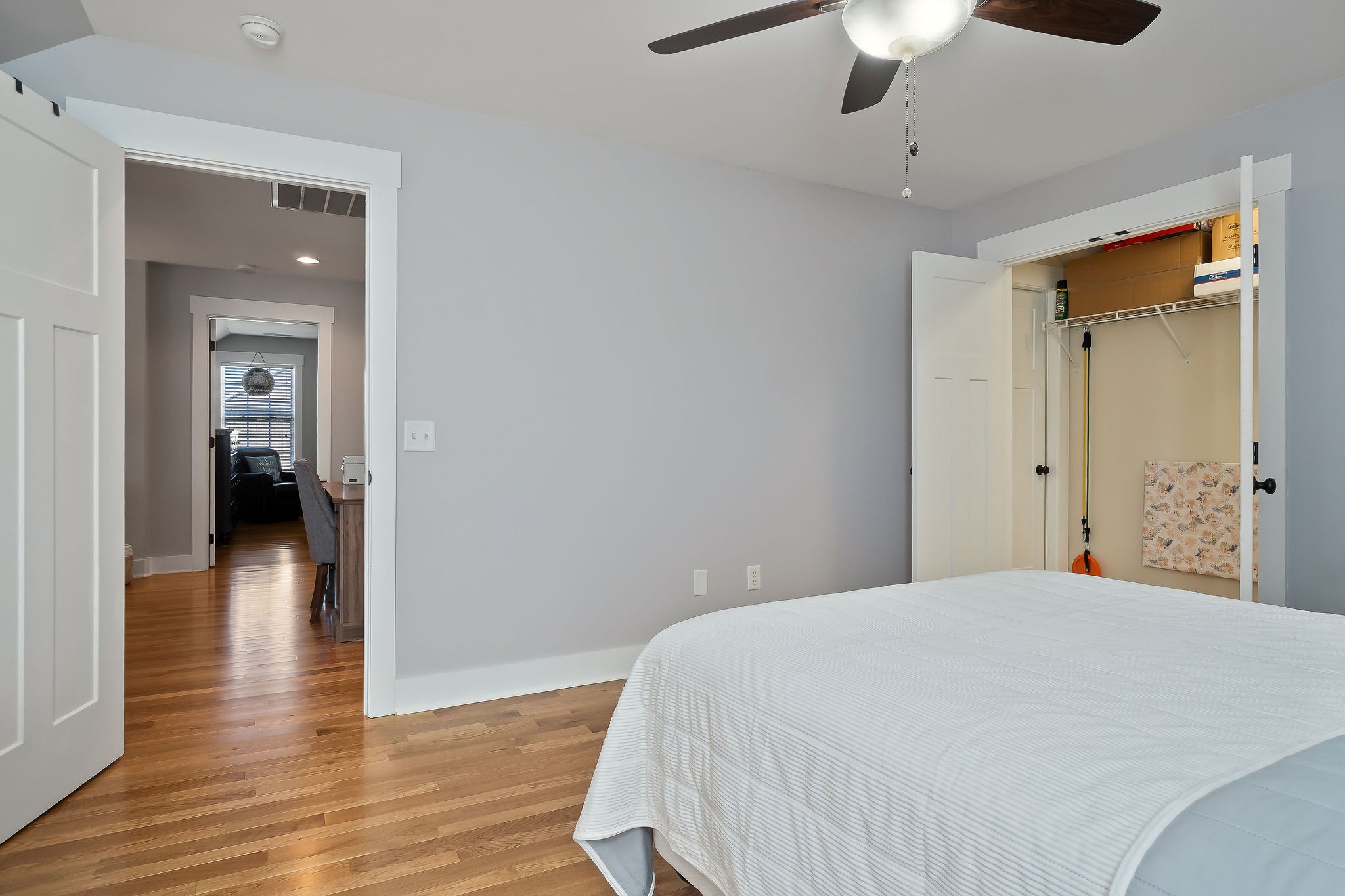 1138 Old Sparta Road Cookeville, TN 38506 - Photo 21 of 39 a bedroom with a bed and a chandelier