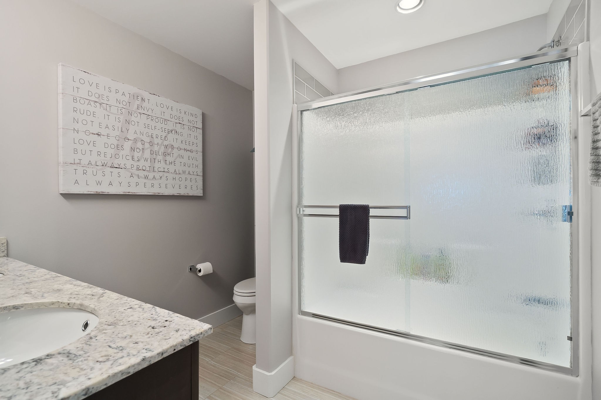 1138 Old Sparta Road Cookeville, TN 38506 - Photo 23 of 39 a bathroom with a granite countertop shower and a sink