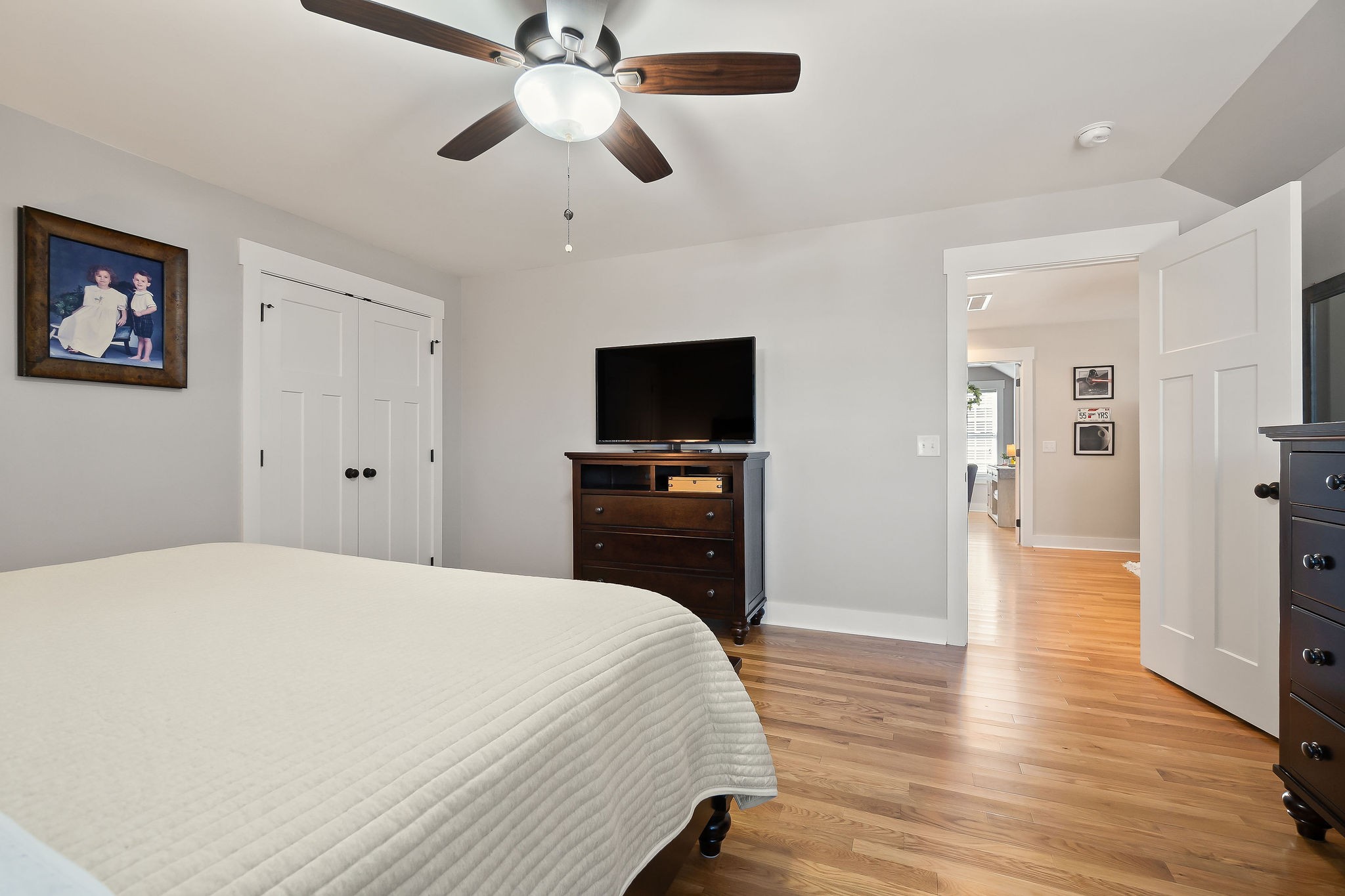 1138 Old Sparta Road Cookeville, TN 38506 - Photo 26 of 39 a bedroom with a bed and a flat tv screen on dresser