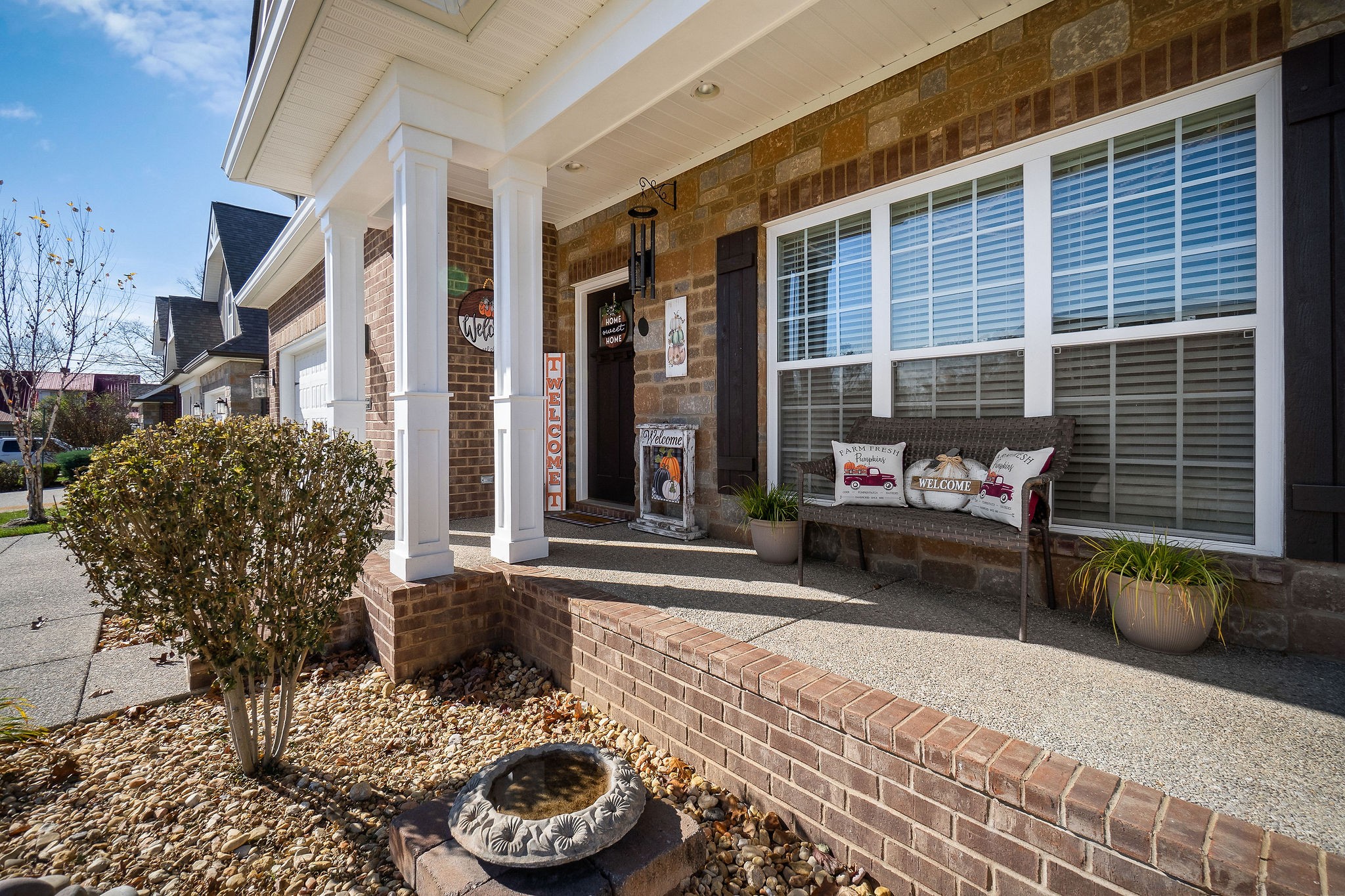 1138 Old Sparta Road Cookeville, TN 38506 - Photo 29 of 39 a view of a patio with table and chairs and floor to ceiling window