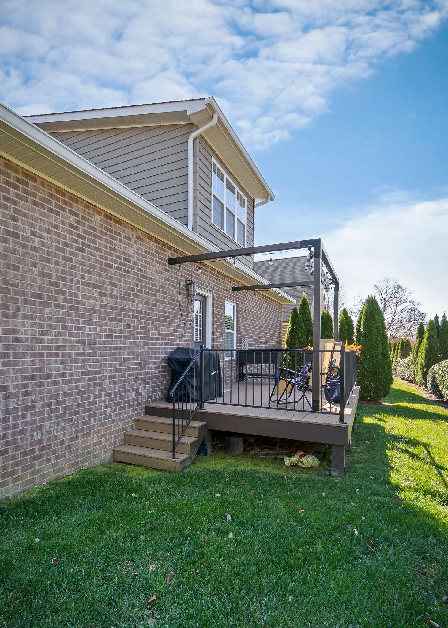 1138 Old Sparta Road Cookeville, TN 38506 - Photo 30 of 39 a view of a chairs and table in the backyard
