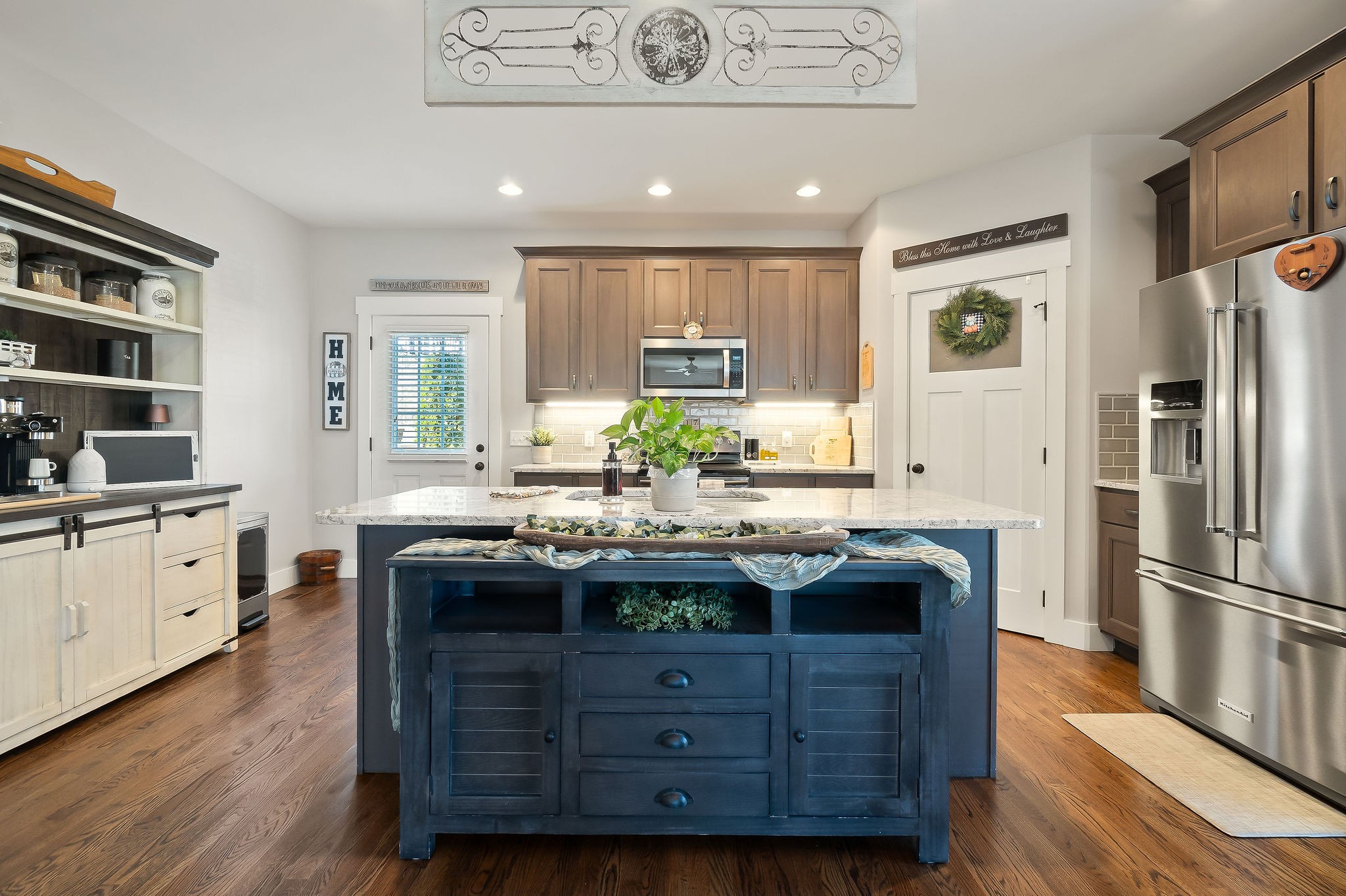 1138 Old Sparta Road Cookeville, TN 38506 - Photo 32 of 39 a kitchen with granite countertop a sink and a refrigerator