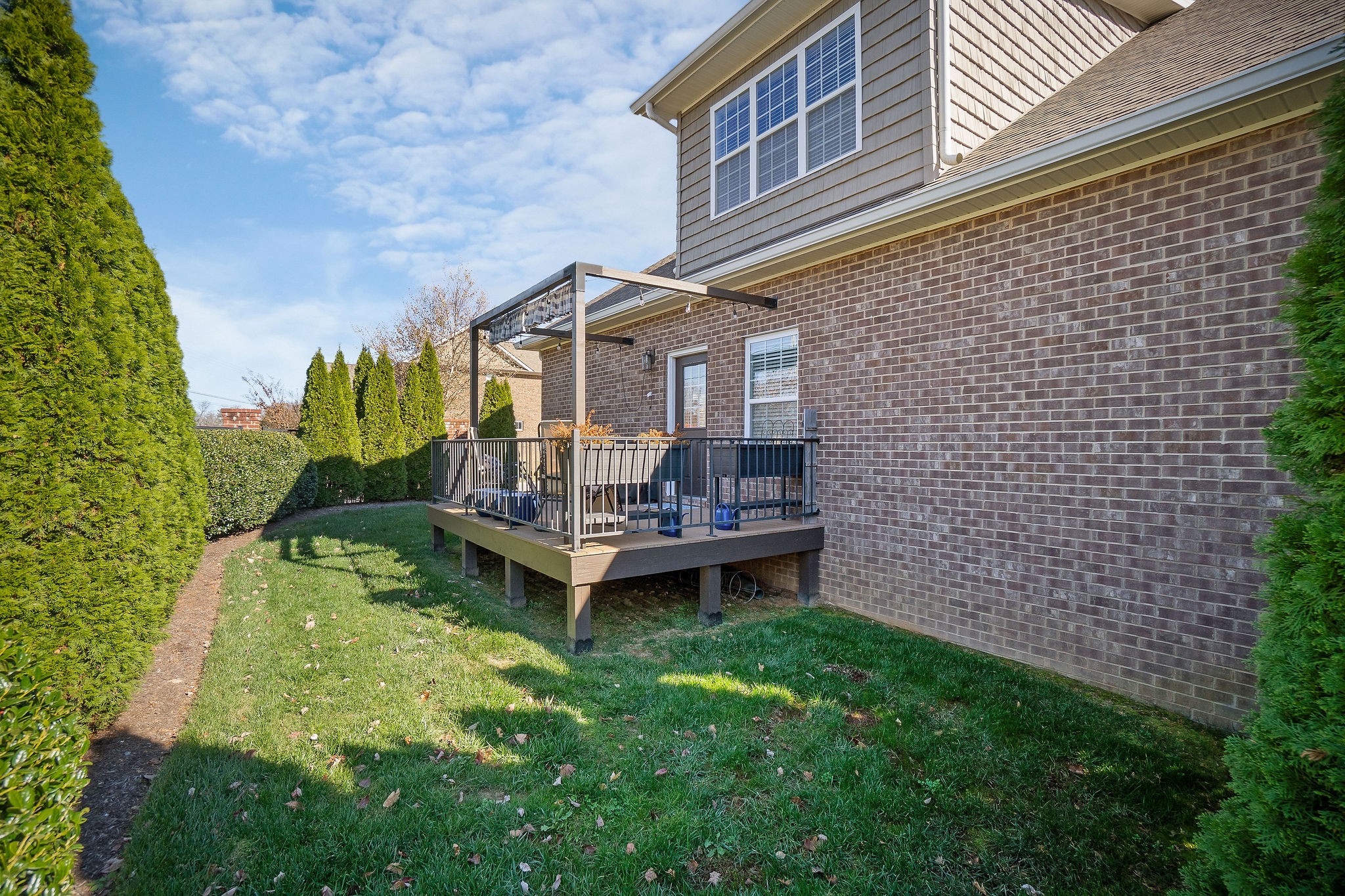1138 Old Sparta Road Cookeville, TN 38506 - Photo 35 of 39 a backyard of a house with table and chairs