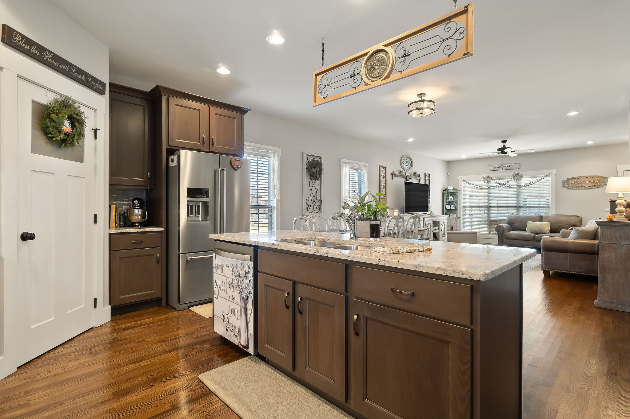 1138 Old Sparta Road Cookeville, TN 38506 - Photo 7 of 39 a kitchen with stainless steel appliances kitchen island granite countertop a refrigerator and a sink