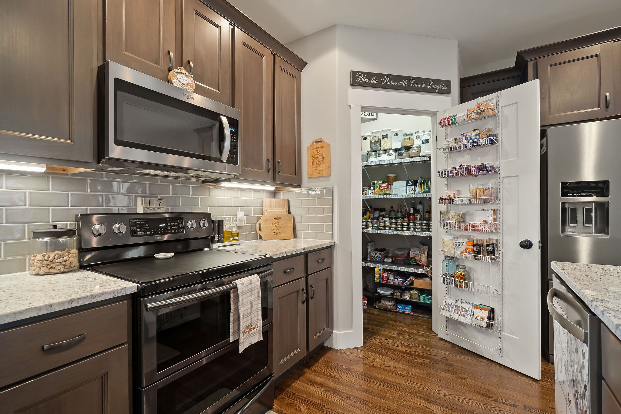 1138 Old Sparta Road Cookeville, TN 38506 - Photo 9 of 39 a kitchen with stainless steel appliances a stove and a refrigerator