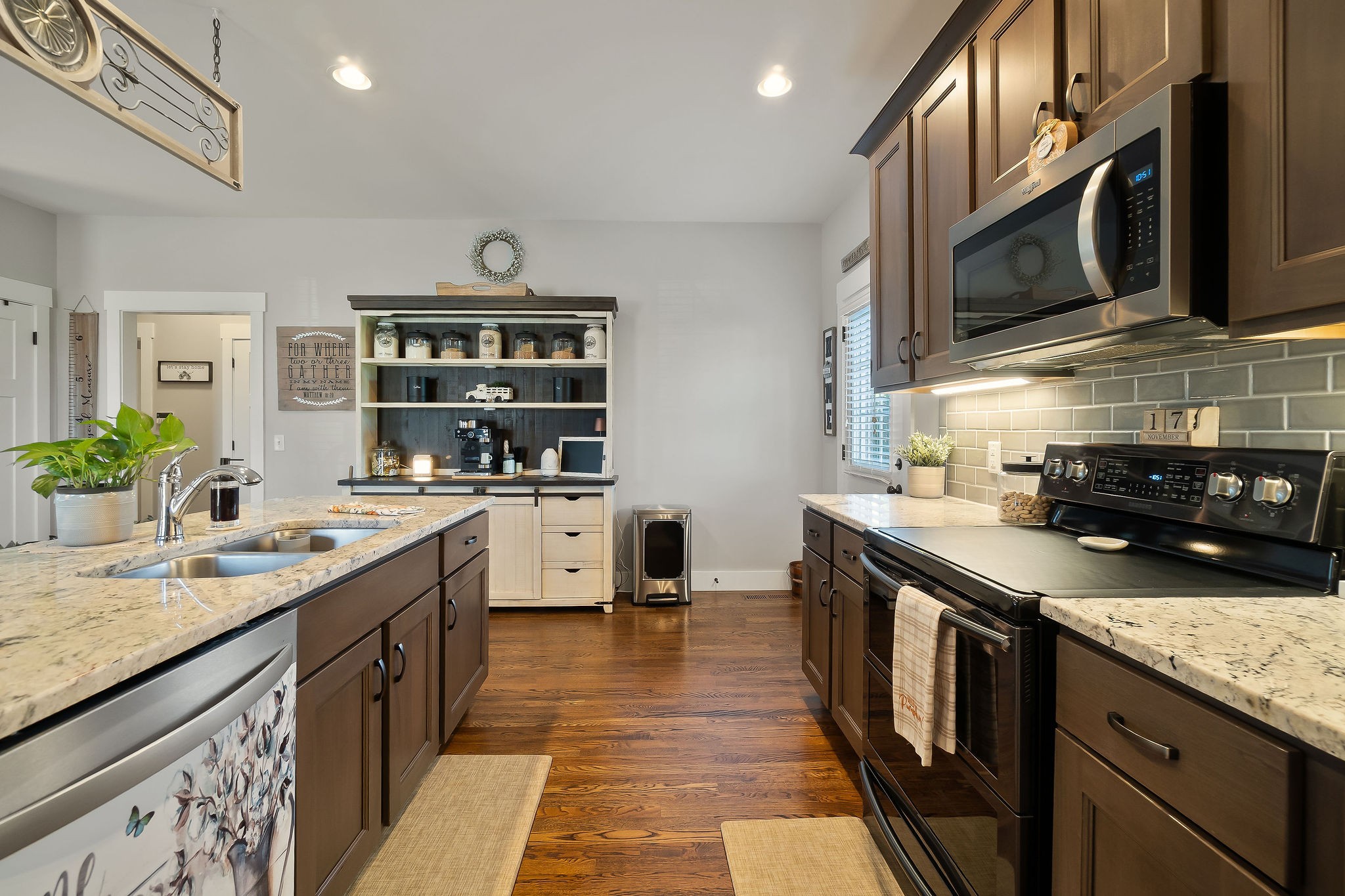 1138 Old Sparta Road Cookeville, TN 38506 - Photo 10 of 39 a kitchen with stainless steel appliances granite countertop a sink stove and cabinets
